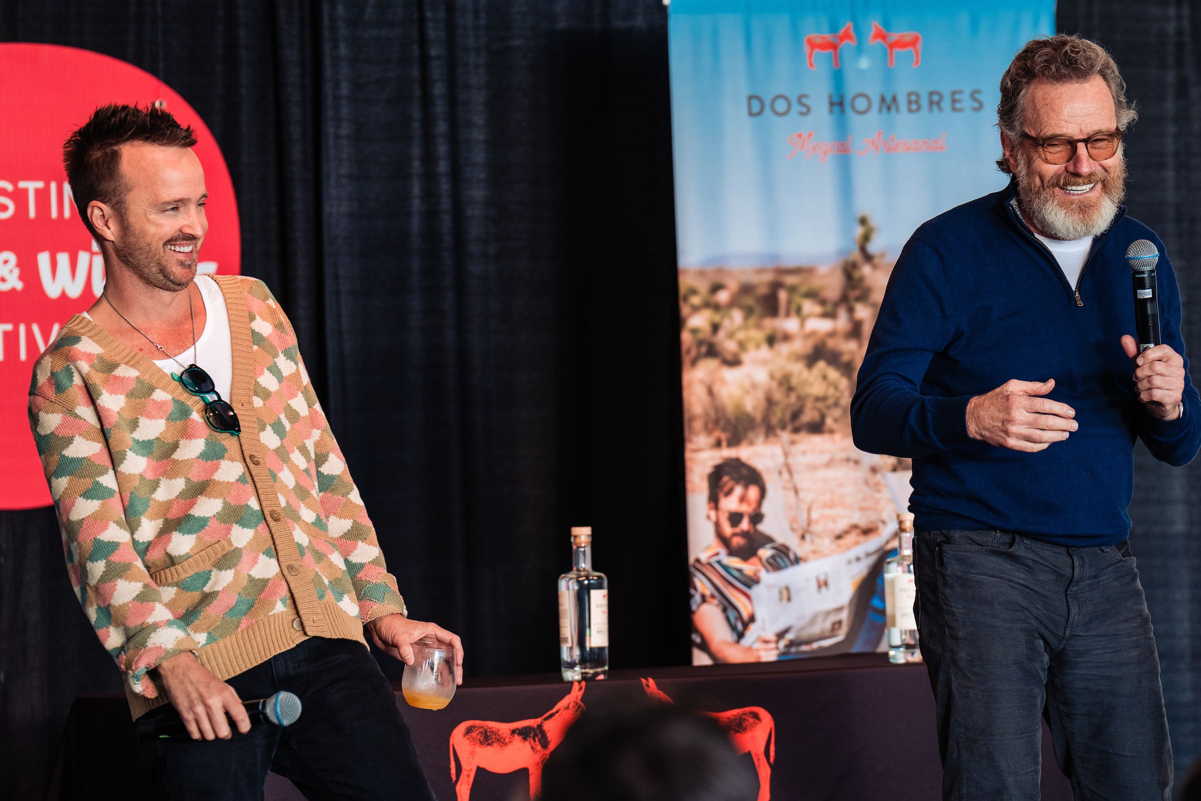 Actors Aaron Paul (left) and Bryan Cranston talk about Dos Hombres mezcal (photo by Roger Ho for Austin Food and Wine Fest 2022)