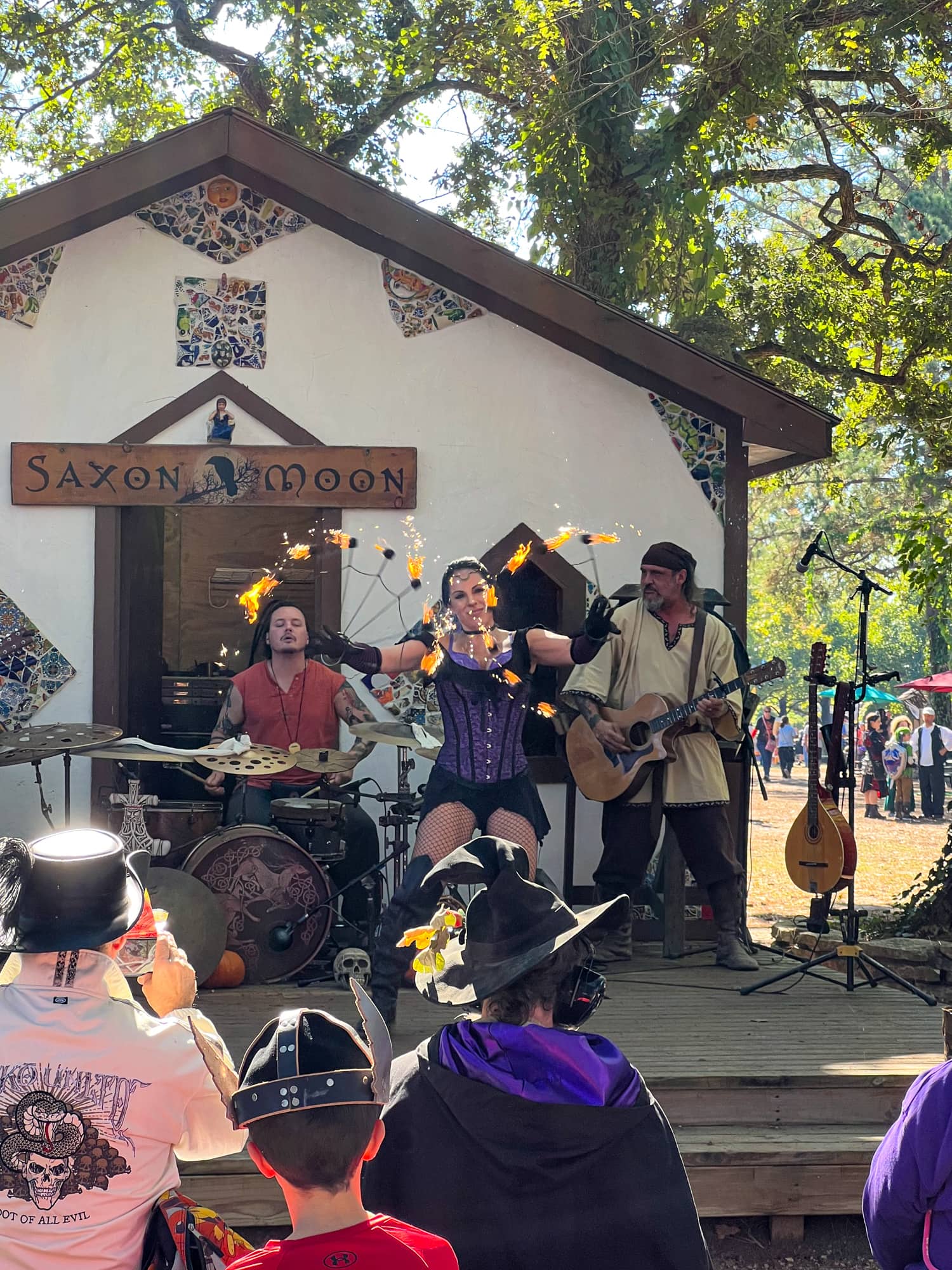 Fire dancer and band performing at the Texas Renaissance Festival