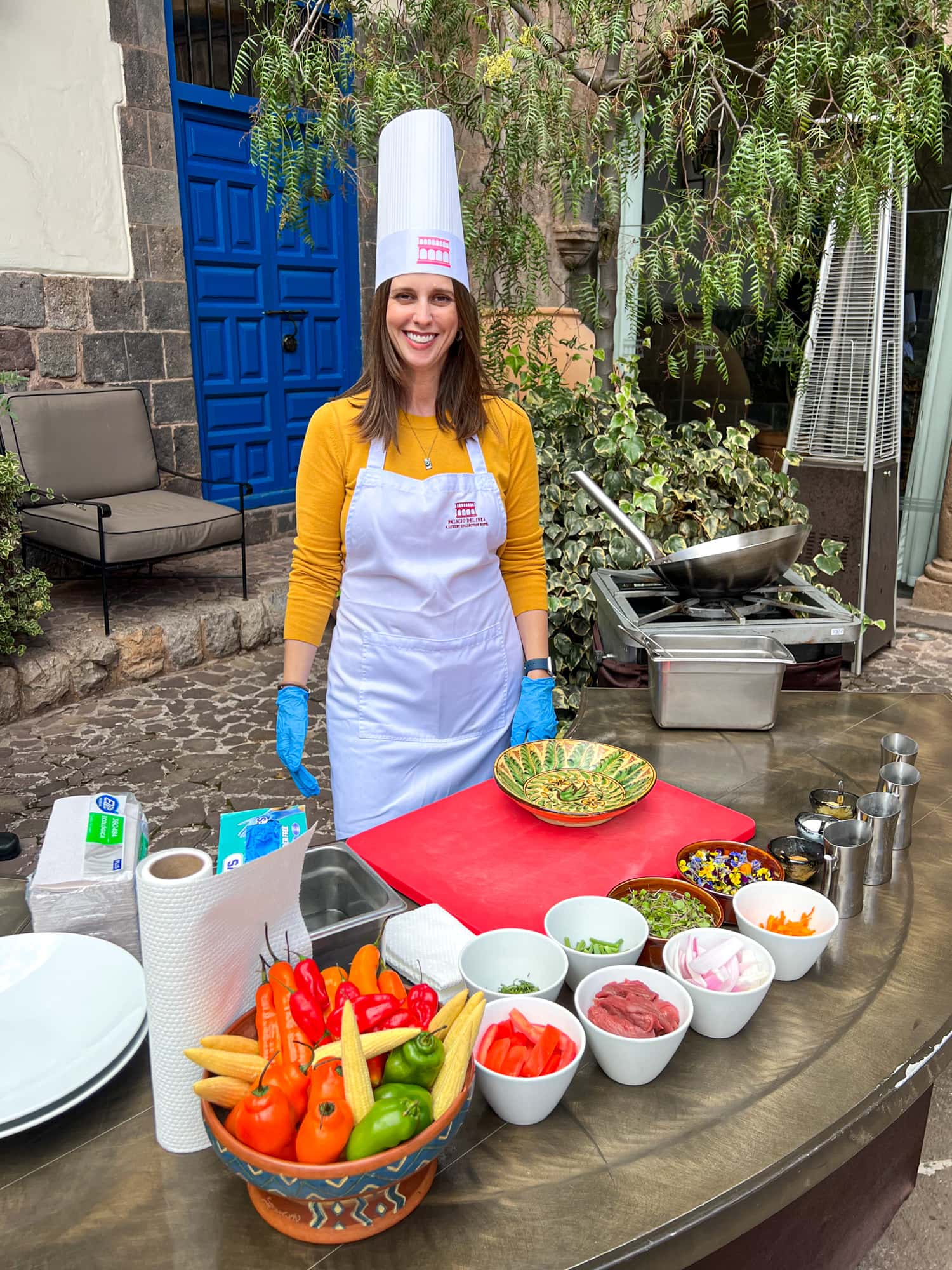 Kel at the outdoor cooking station