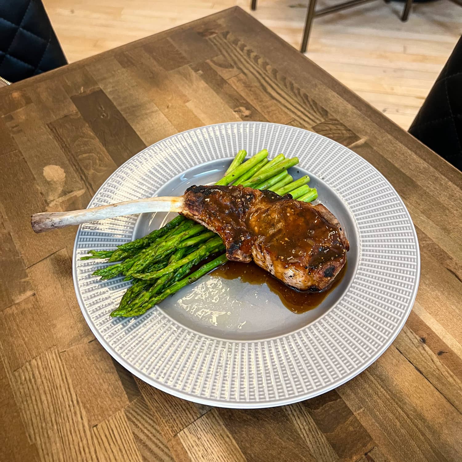 Tomahawk pork chop with asparagus