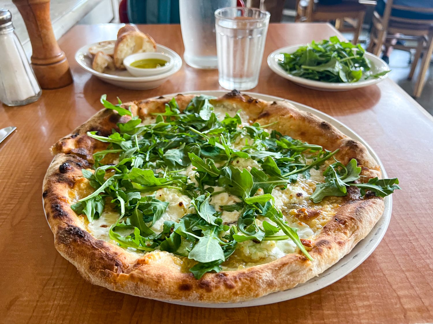 Biancoverde pizza with fresh mozzarella, parmigiano reggiano, ricotta and arugula at Pizzeria Bianco in Phoenix, AZ