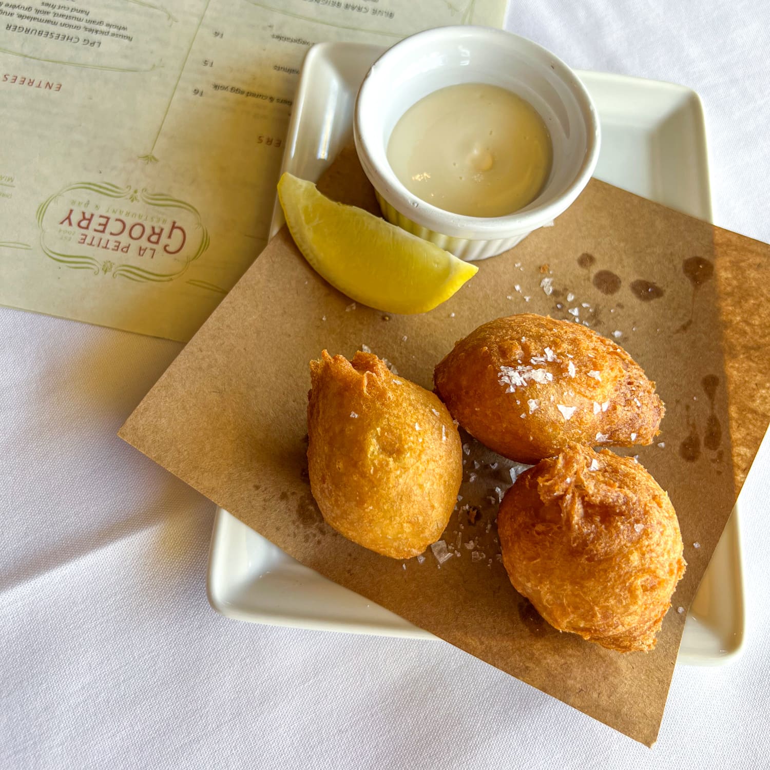 Blue crab beignets at La Petite Grocery in New Orleans, LA