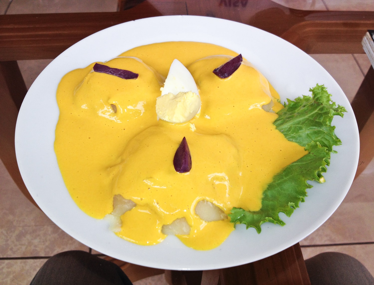 Papa a la huancaina is a typical Peruvian food served as an appetizer or side dish.