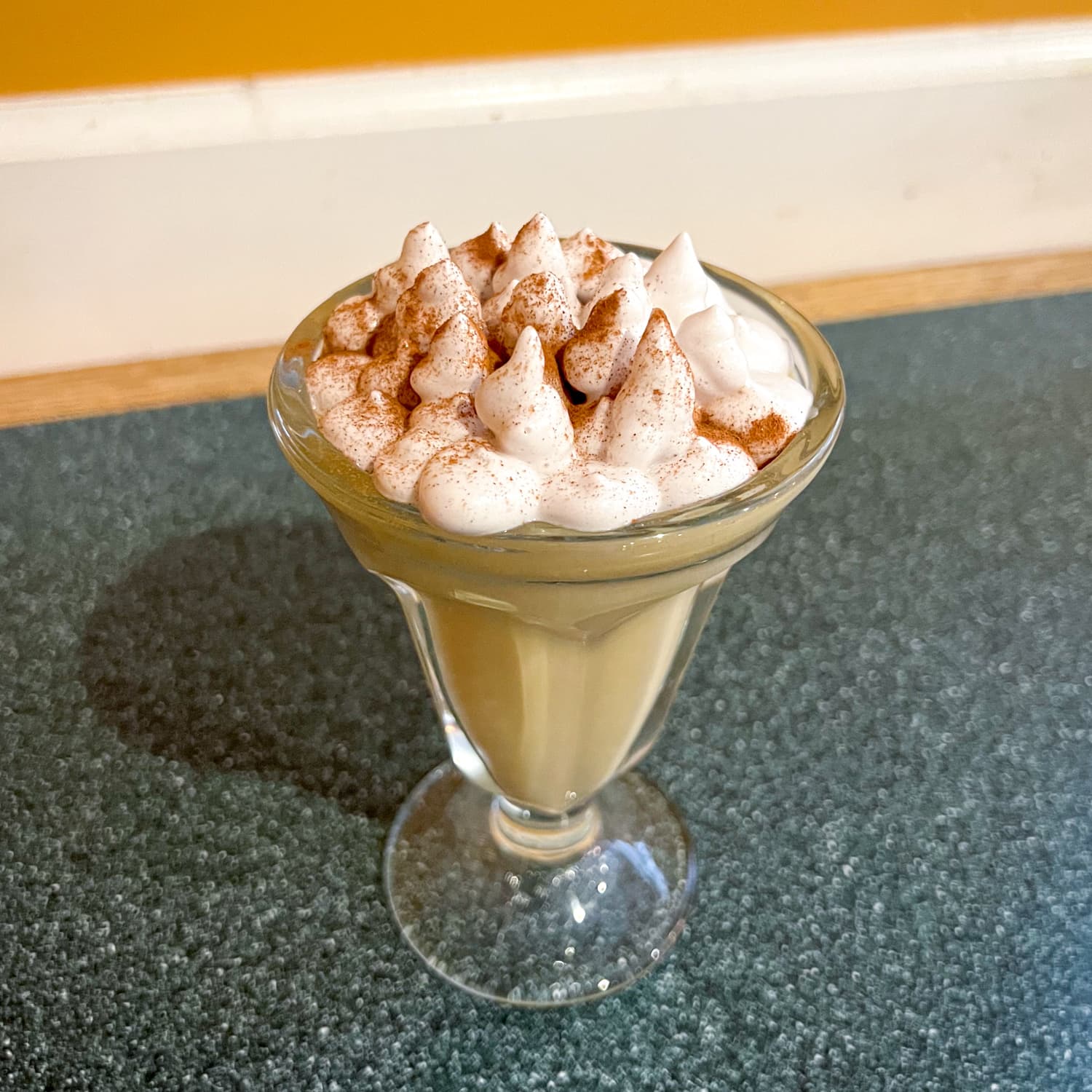 Suspiro de Limena, a Peruvian dessert made with dulce de leche pudding and a meringue topping, at Lima Criolla restaurant