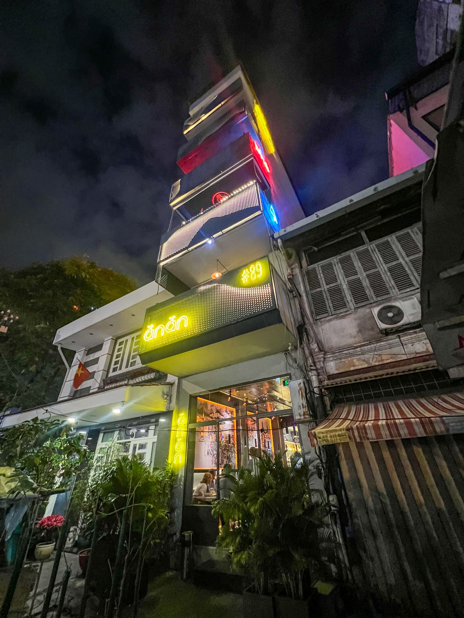 Outside Anan Saigon restaurant at night