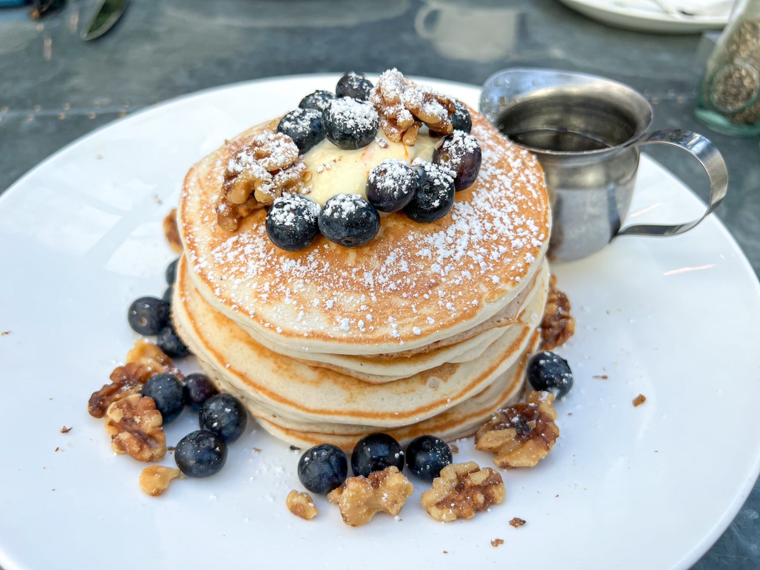 Blueberry buttermilk pancakes with orange mascarpone and walnuts