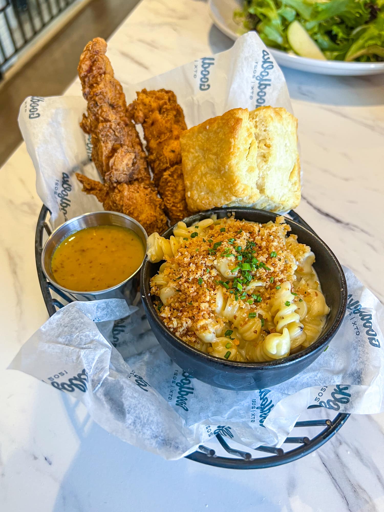 Chicken tenders, mac 'n cheese, and a homemade biscuit at Goodfolks