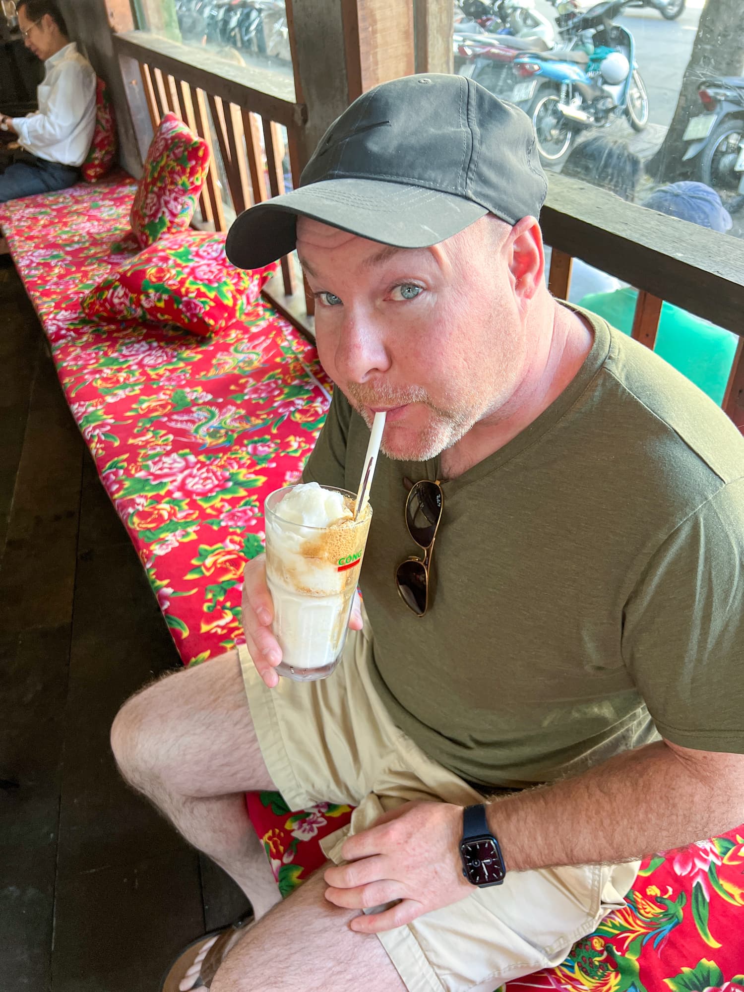 Dave sipping coconut coffee at a Cong Caphe