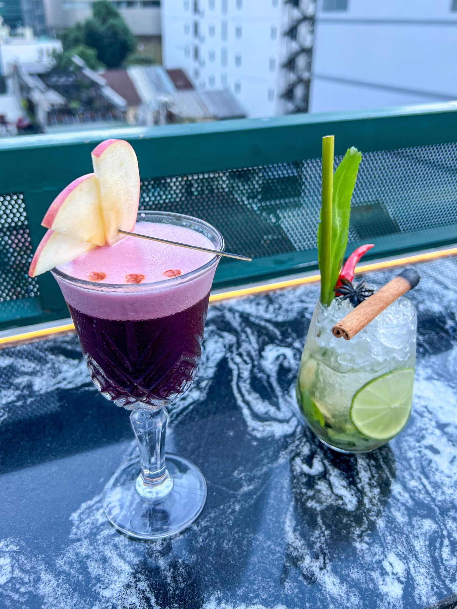 Mulberry Clover Club cocktail at Nhau Nhau rooftop bar