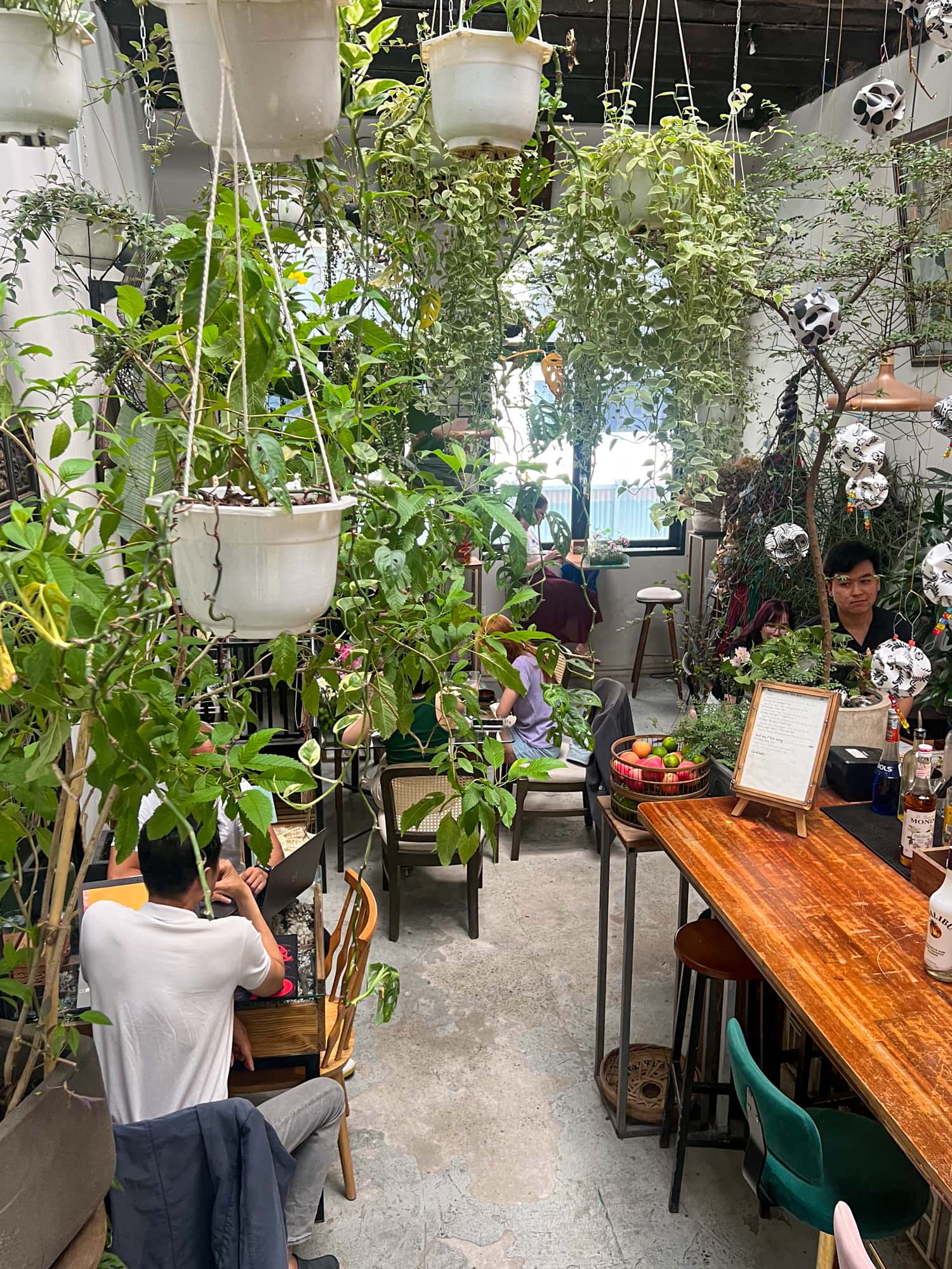 The lush interior of Padma de Fleur, a florist cafe in Saigon