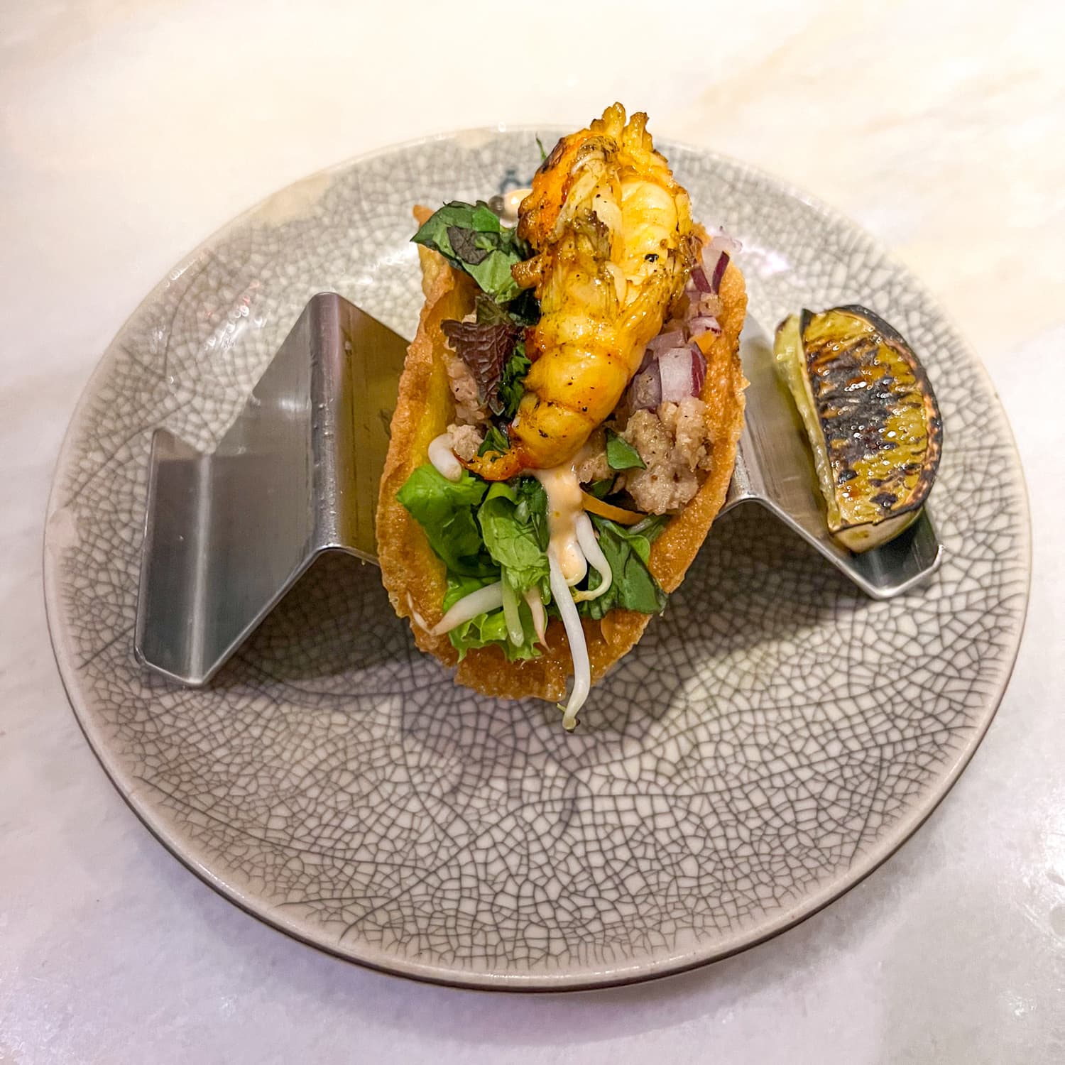 Prawn and pork belly taco