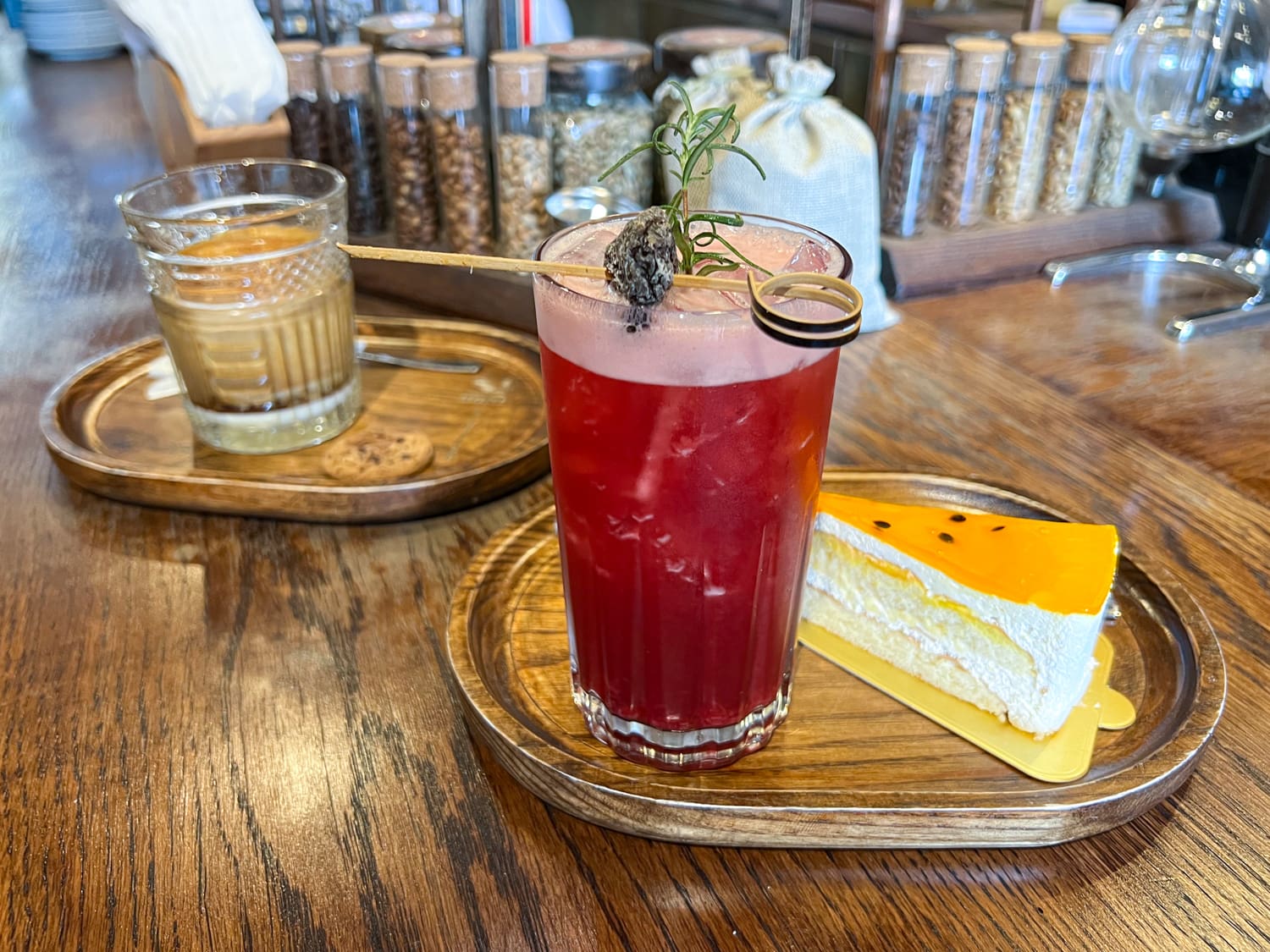 Vietnamese egg coffee, a fruit drink, and passion fruit cake at Soo Kafe in Saigon