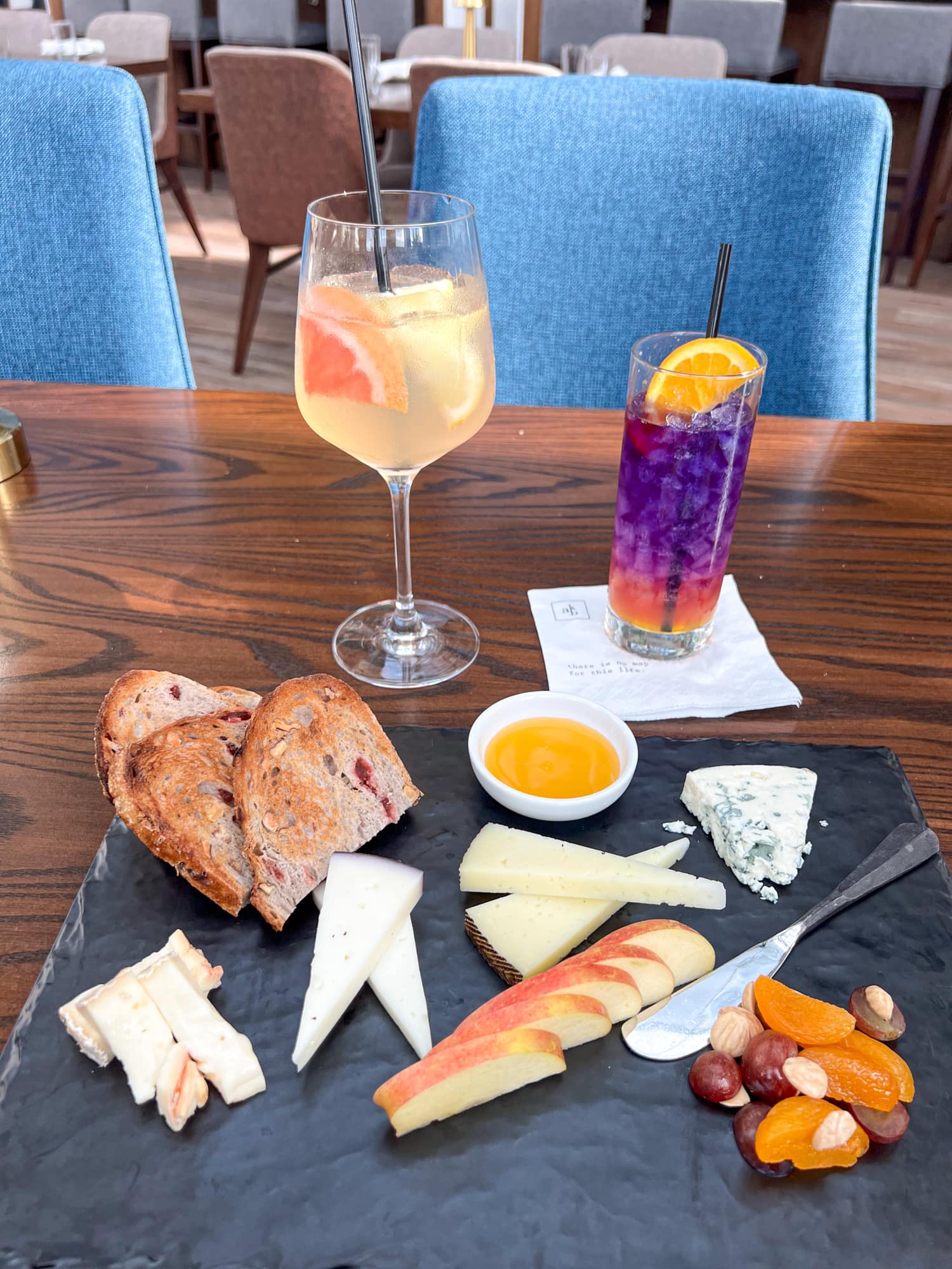 Cheese board (left to right): brie, drunken goat cheese, taleggio, and blue cheese