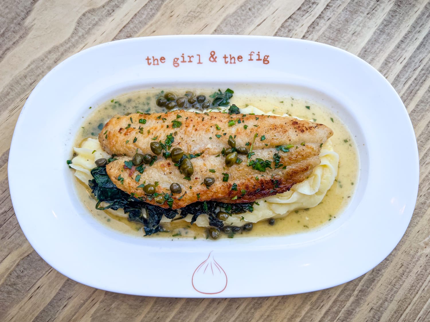 Flounder meuniere on Yukon potato puree and spinach with lemon-caper brown butter