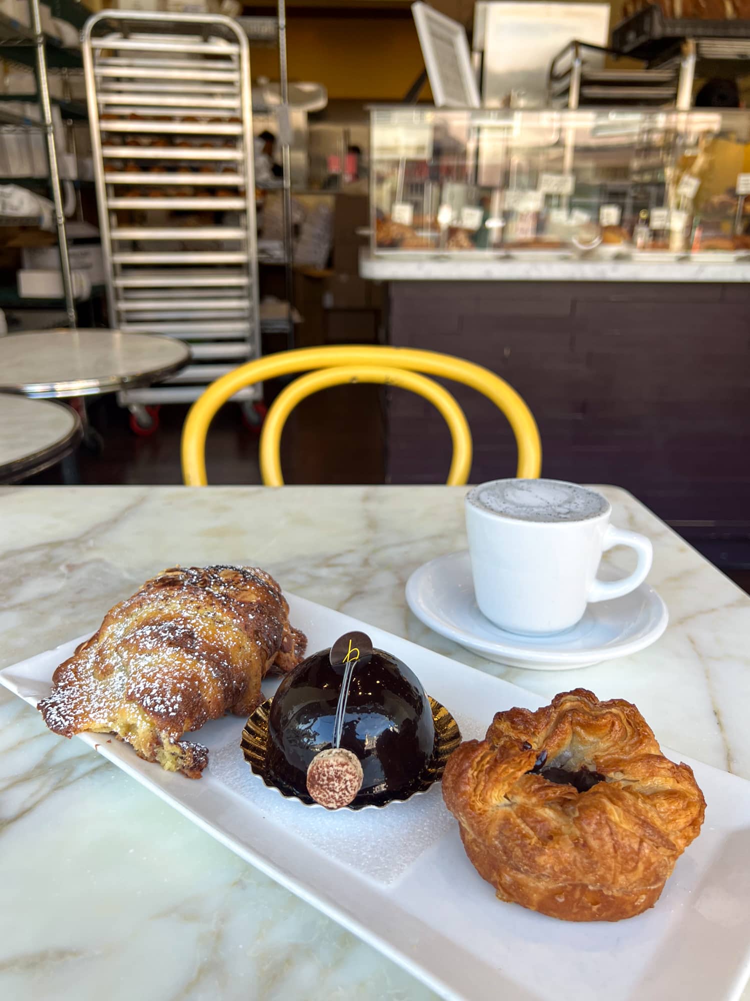 Chocolate banana almond croissant (left), chocolate caramel toffee mousse (middle), and a chocolate kouign amann at b. Patisserie in San Francisco, CA