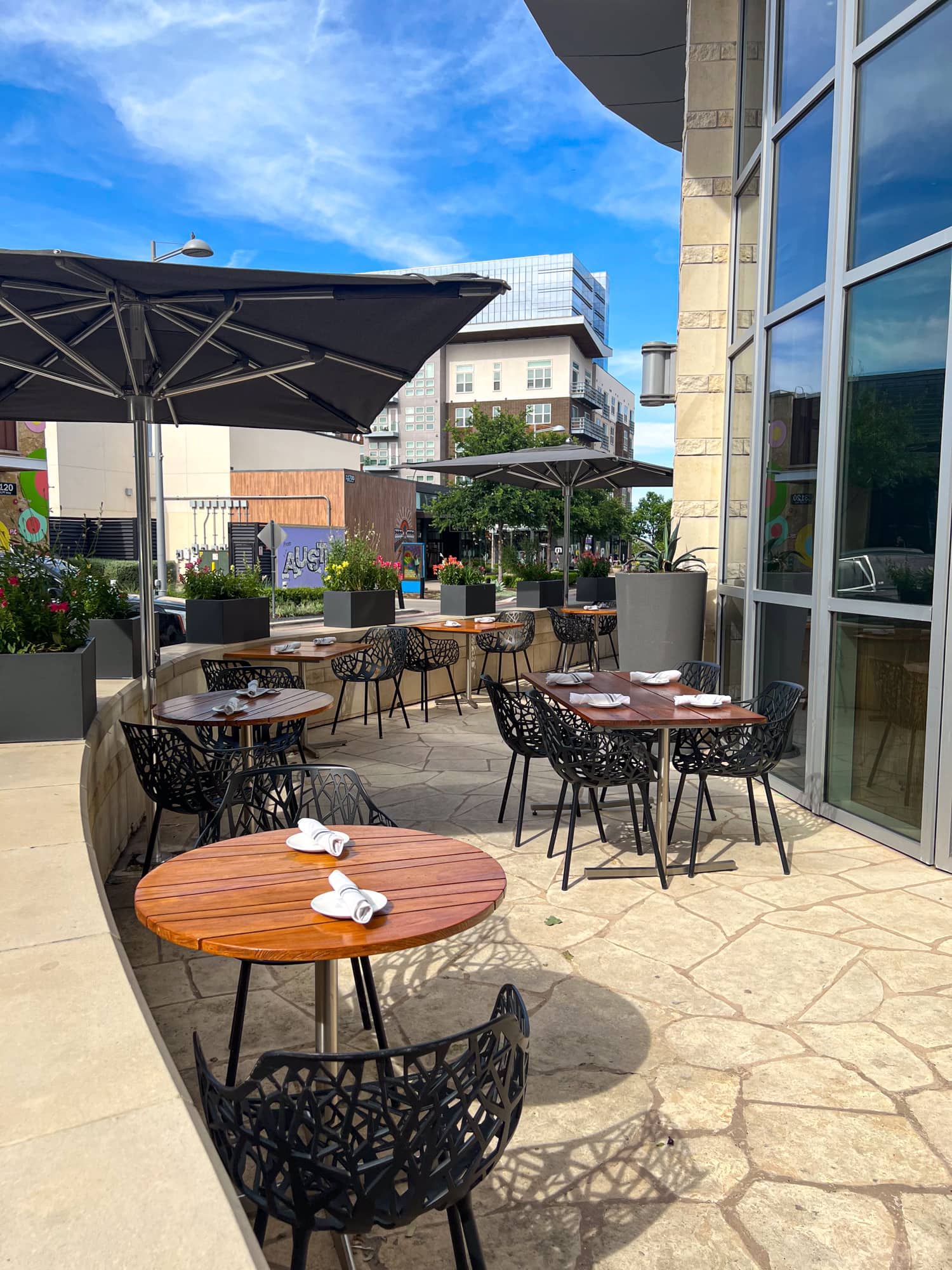 Outdoor patio at the AKB Hotel Bar in Austin, TX