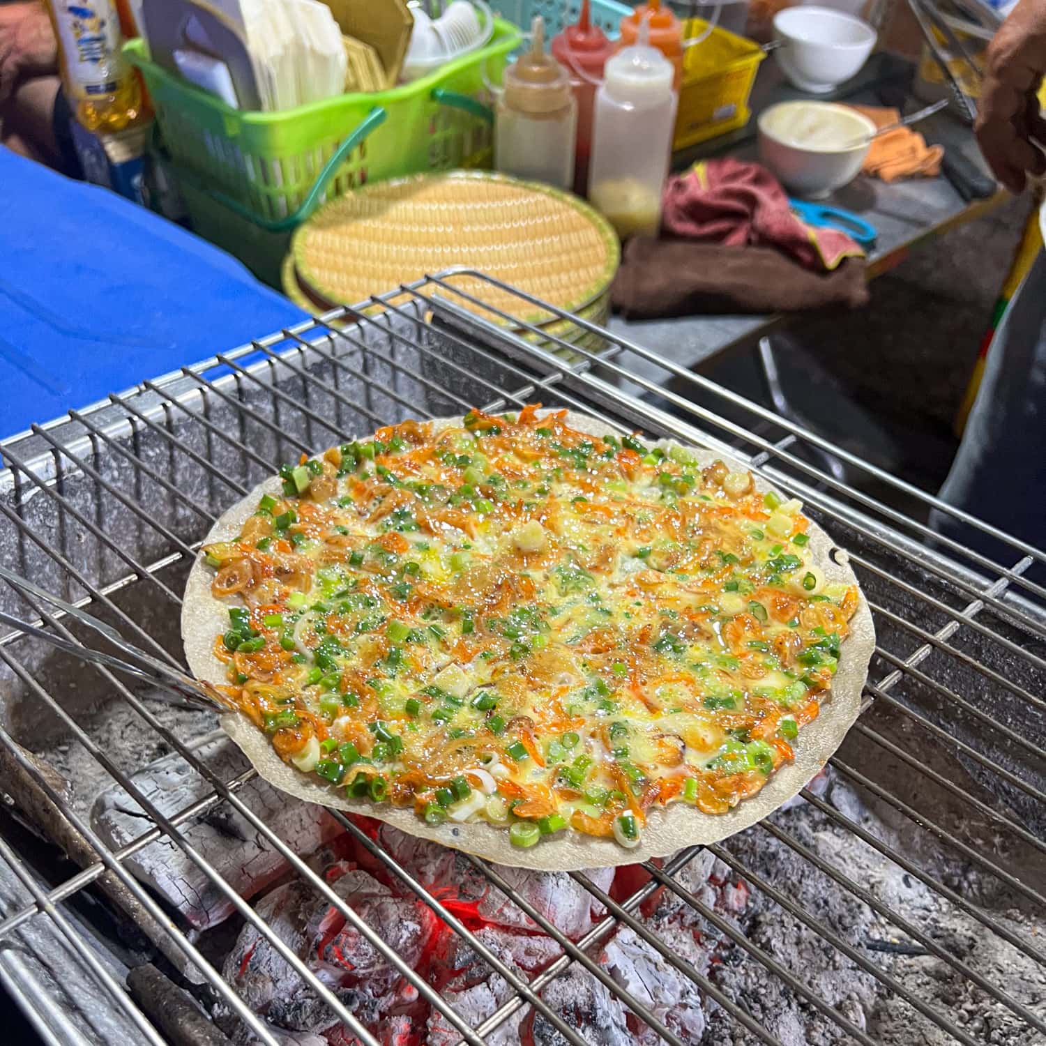 Banh trang nuong, also known as Vietnamese pizza in English, was a tasty meal on our Saigon street food tour.