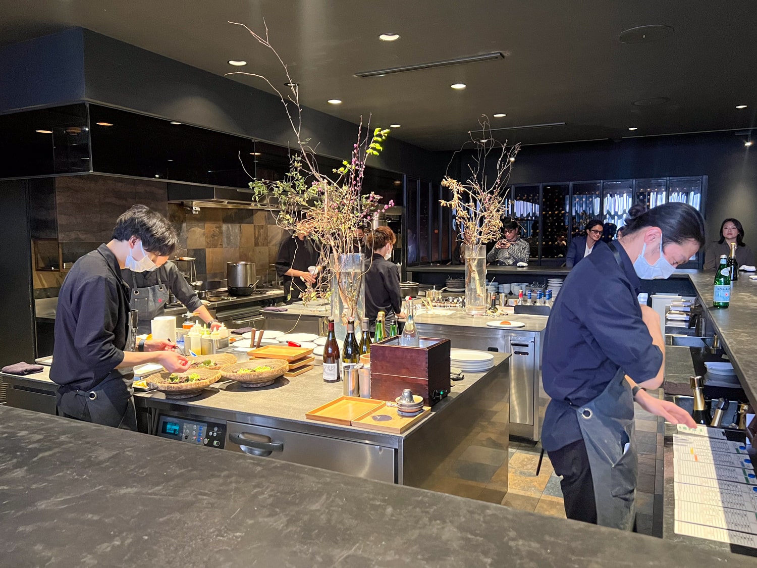 Chefs at work in Florilege Restaurant's open kitchen