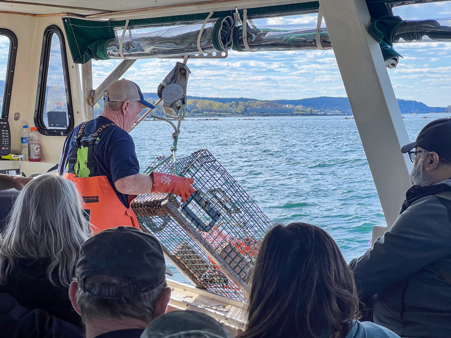 The Captain pulls up a lobster trap