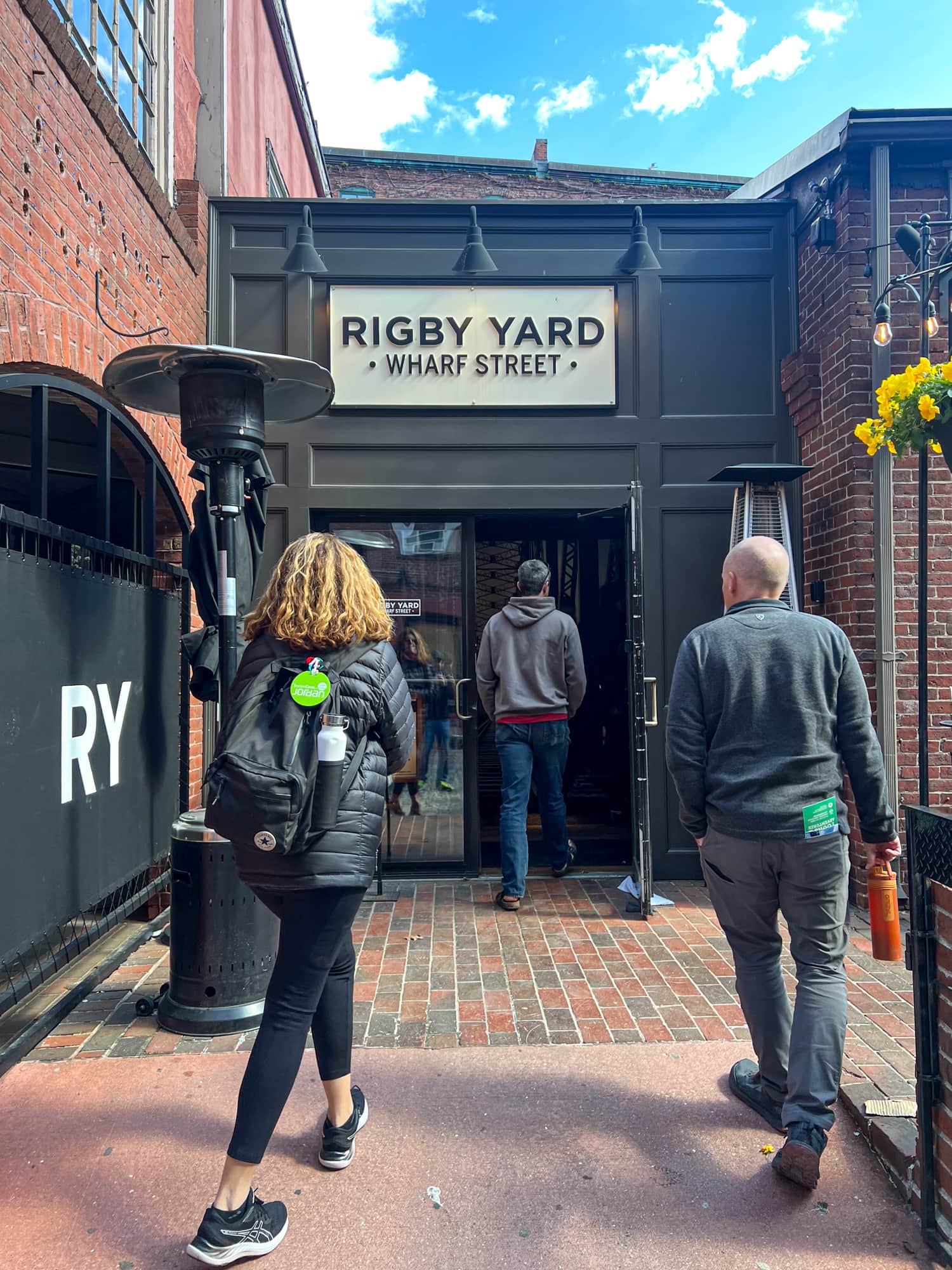 Entering Rigby Yard bar, our third stop on the food tour of Portland, Maine