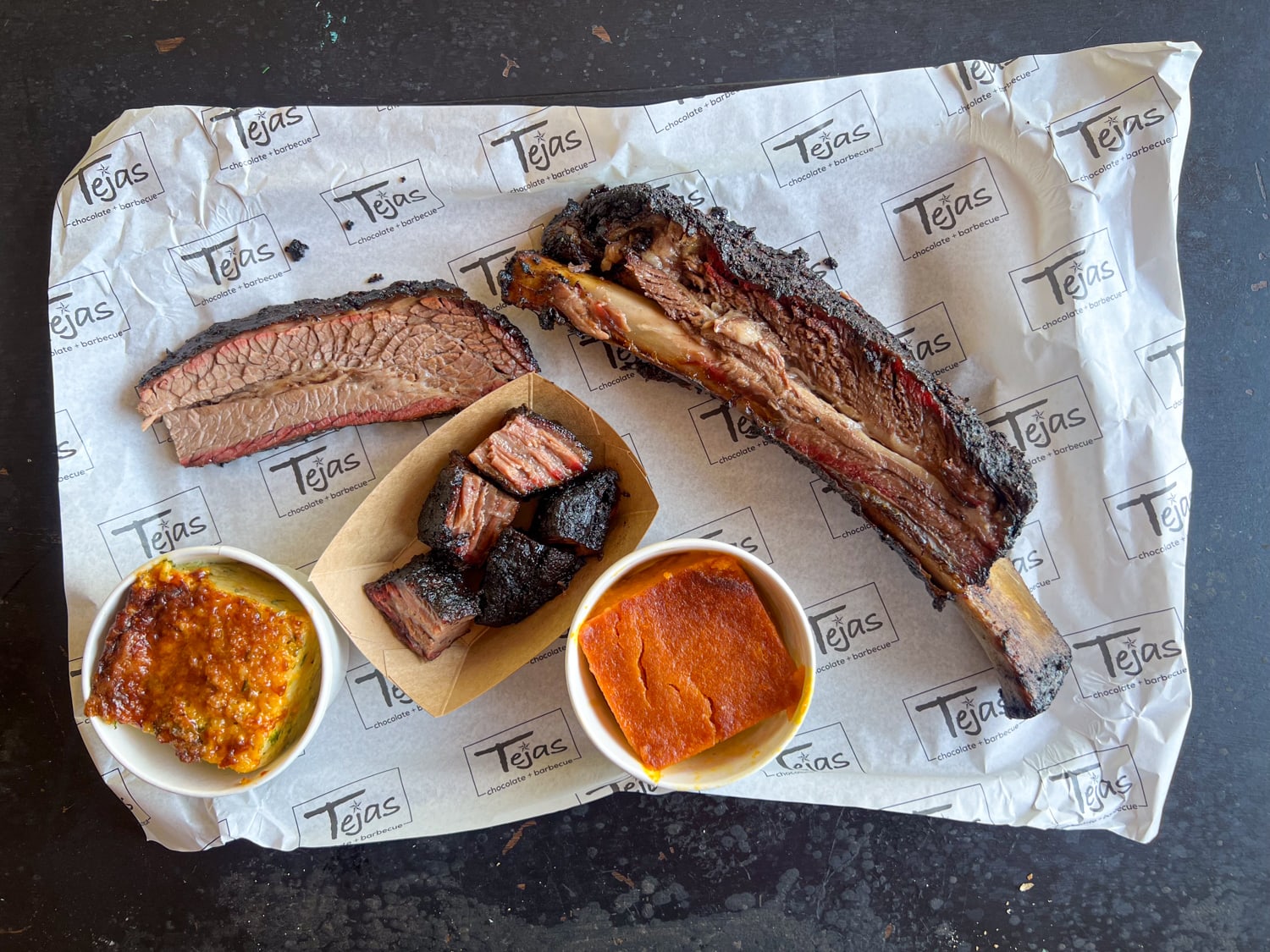 Beef rib, fatty brisket, burnt ends, and sides at Tejas chocolate + barbecue north of Houston, TX