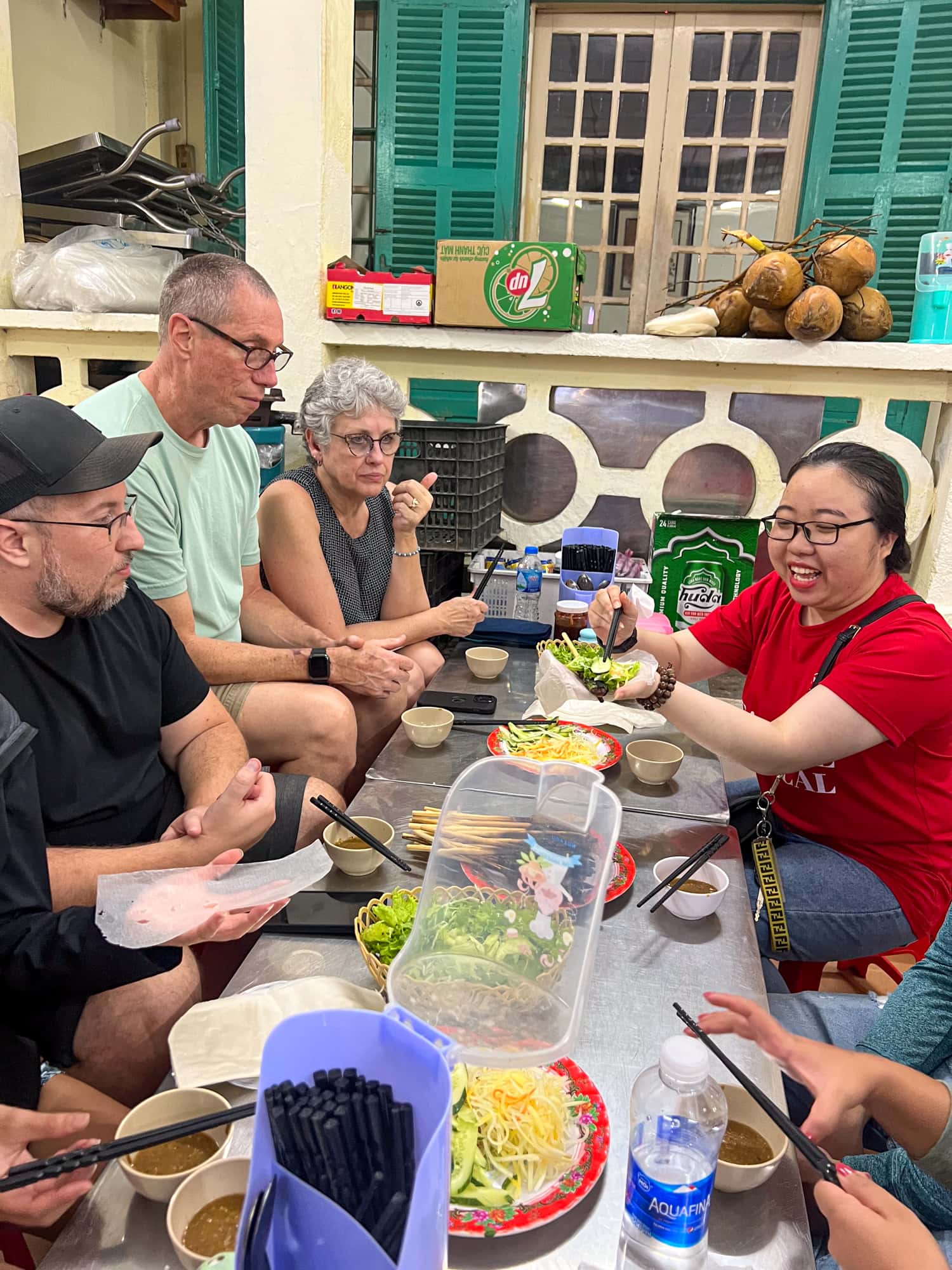 Our guide instructing us on how to eat Vietnamese street food