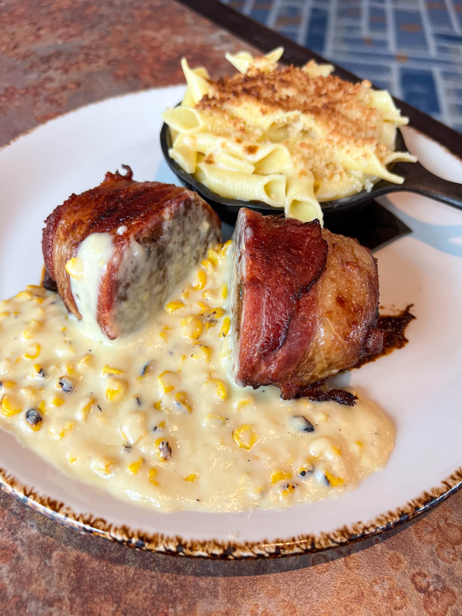 Bacon-wrapped meatloaf with creamed corn and mac 'n cheese at Alma by Stephen Pyles, one of Georgetown's best new restaurants.