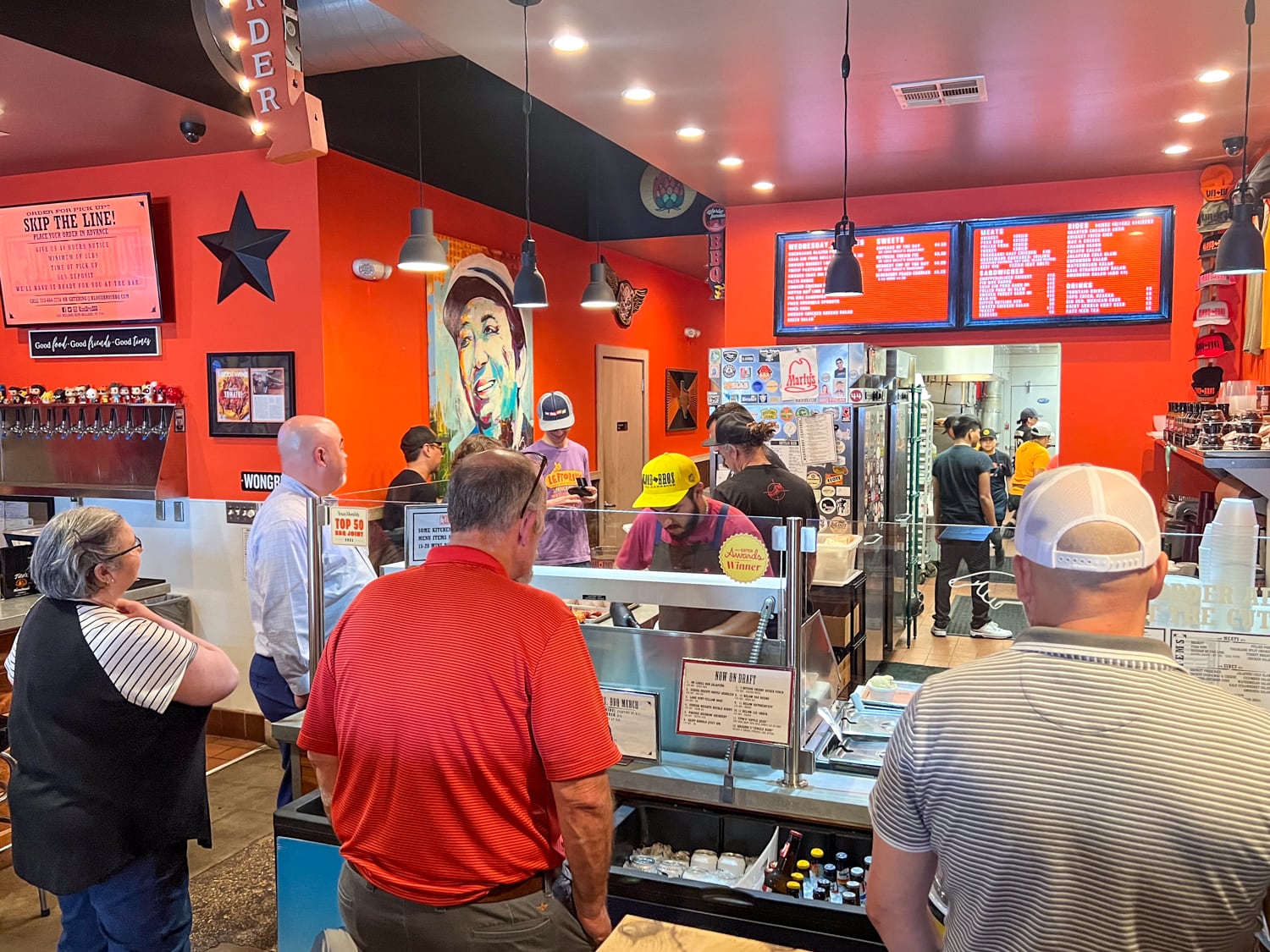 Customers ordering at Blood Bros. BBQ in Houston, TX