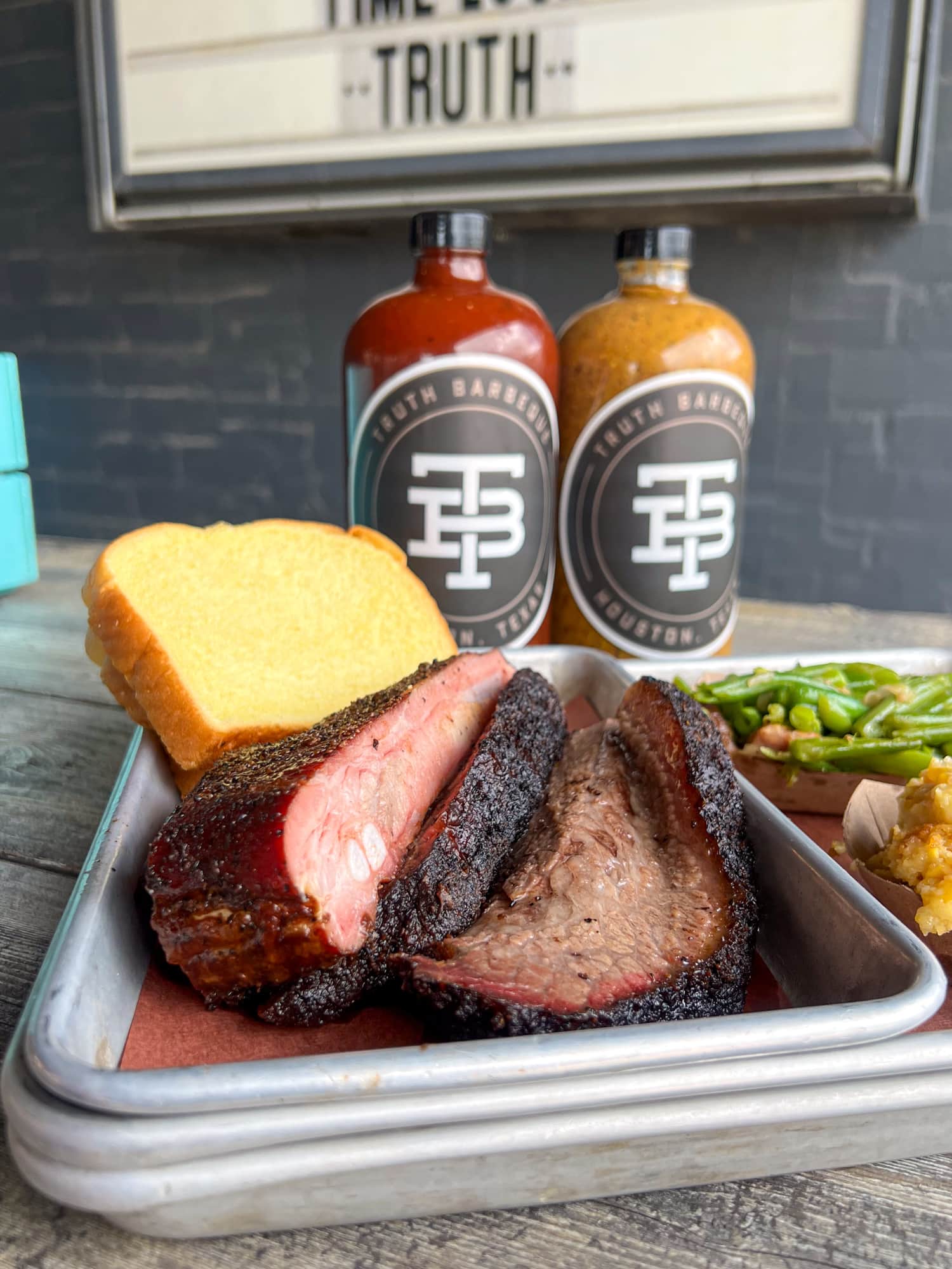 Fatty brisket and pork ribs at Truth BBQ in Houston