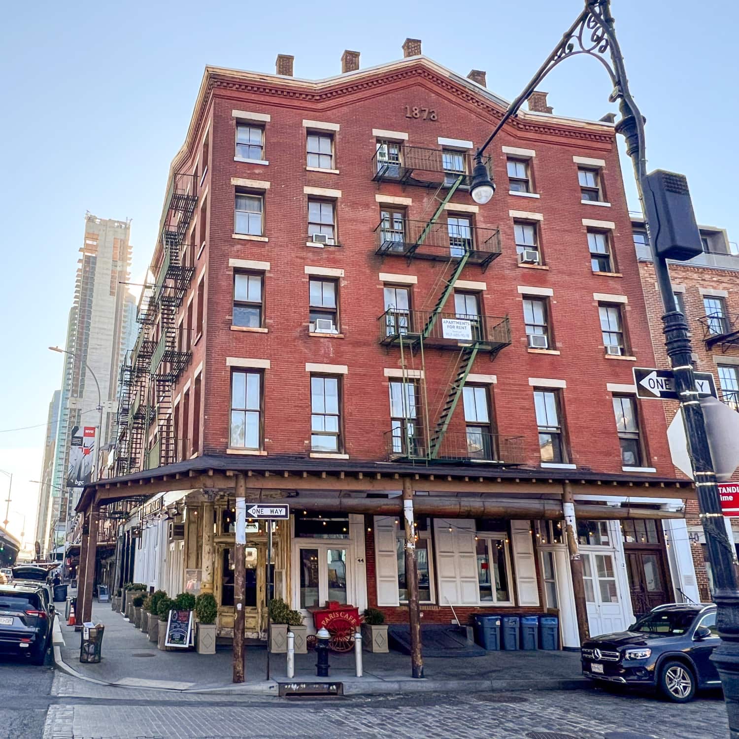 The red brick building with The Paris Cafe on the first floor.