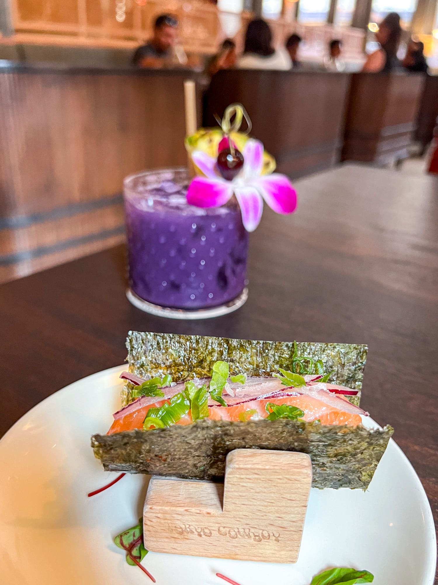 Salmon poke taco and an ube cocktail at Tokyo Cowboy, one of downtown San Antonio's best restaurants