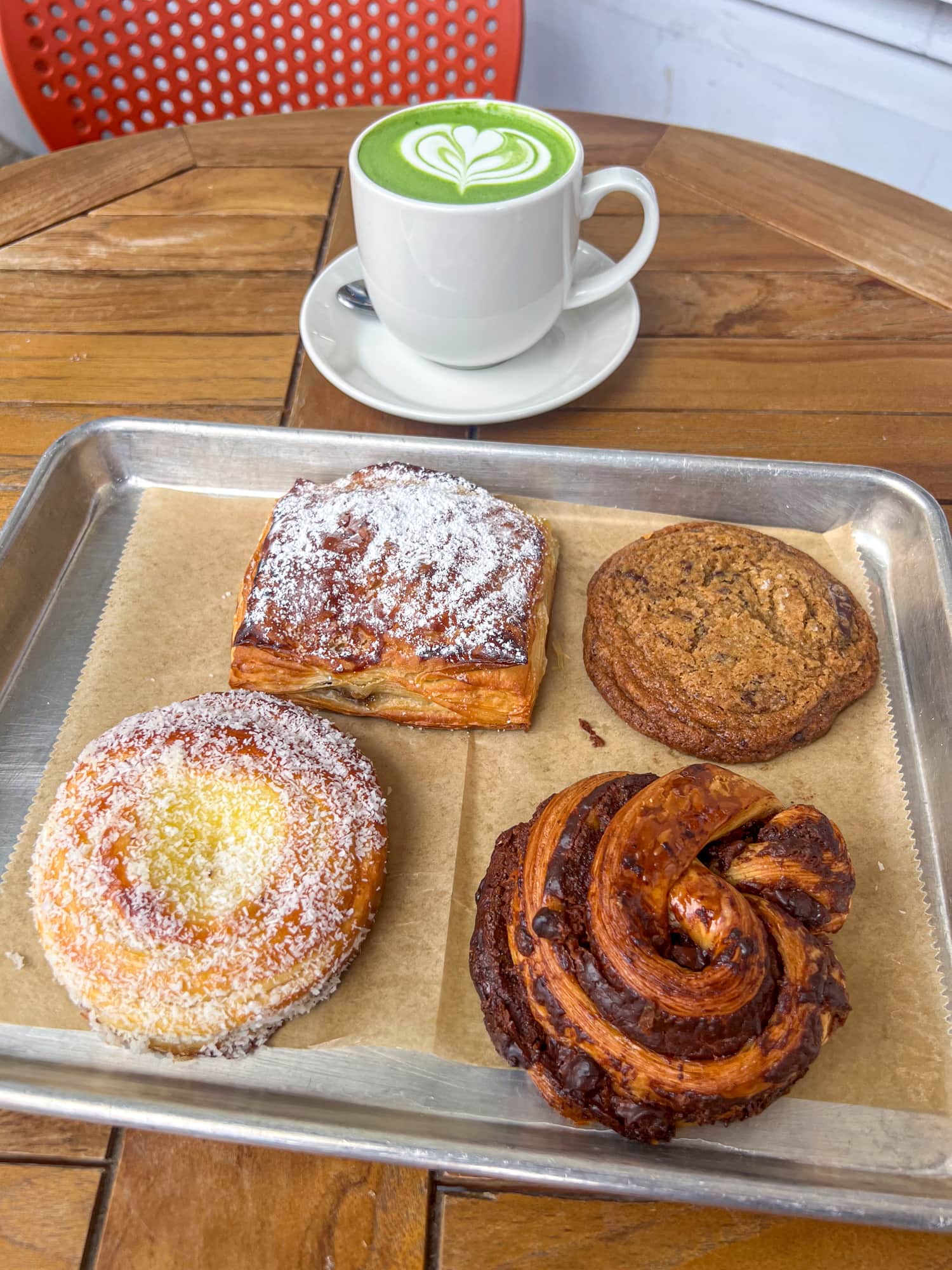 Assorted pastries and matcha tea at Ayu Bakehouse