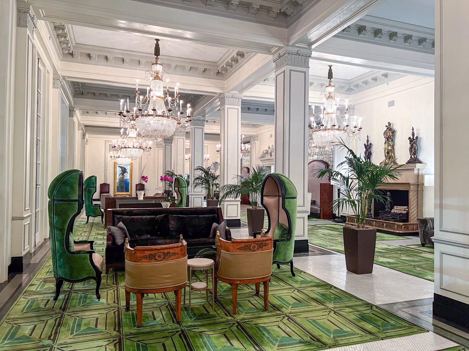 "St. Anthony Green" rugs and chairs in Peacock Alley on the ground floor.