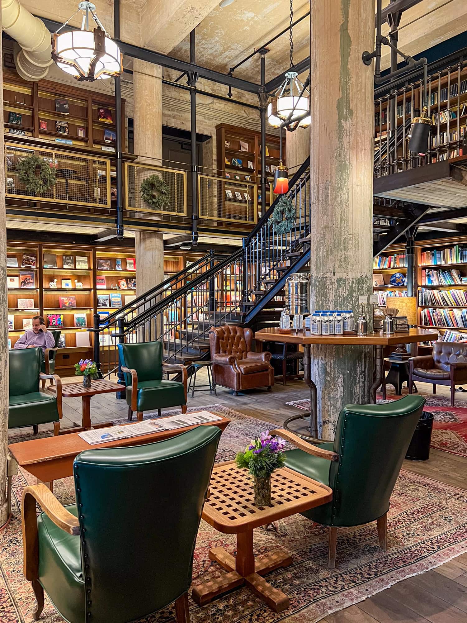 The two-story library at Hotel Emma.