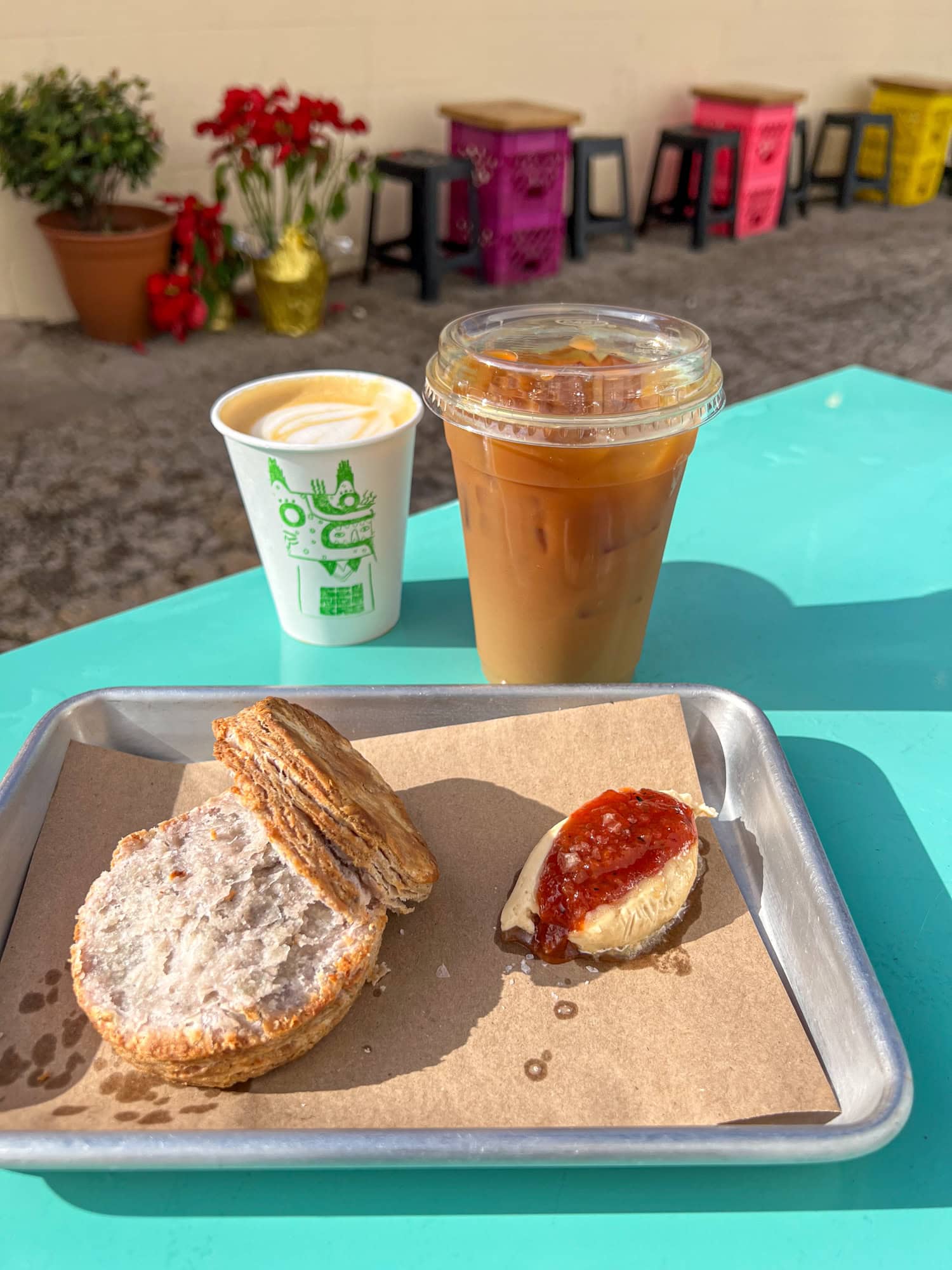 Horchata cold brew, El Camotero cappuccino, and biscuit with jam at Mercado Sin Nombre.