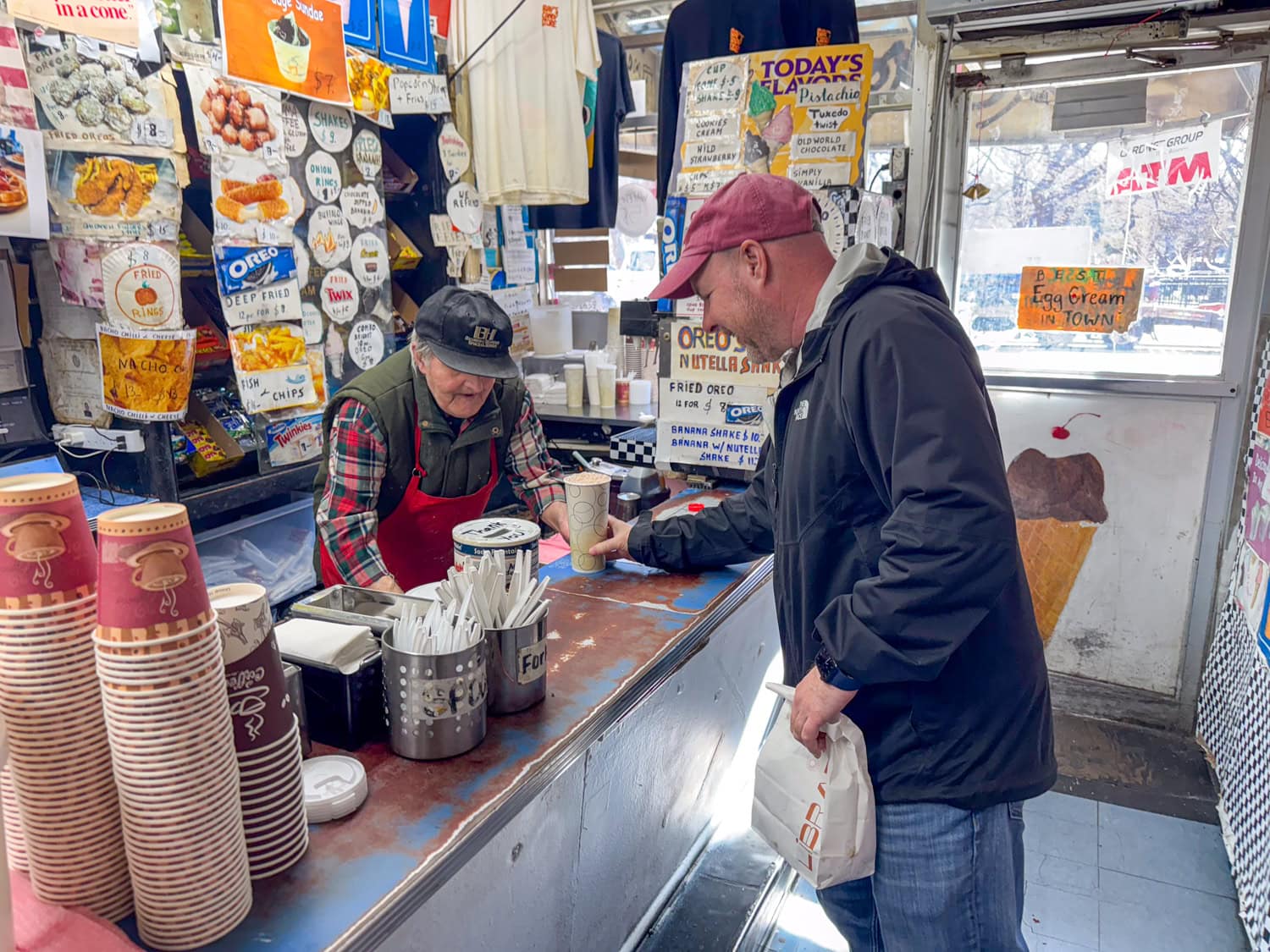 Dave receives his chocolate egg cream at Ray's Candy Store, an East Village institution.