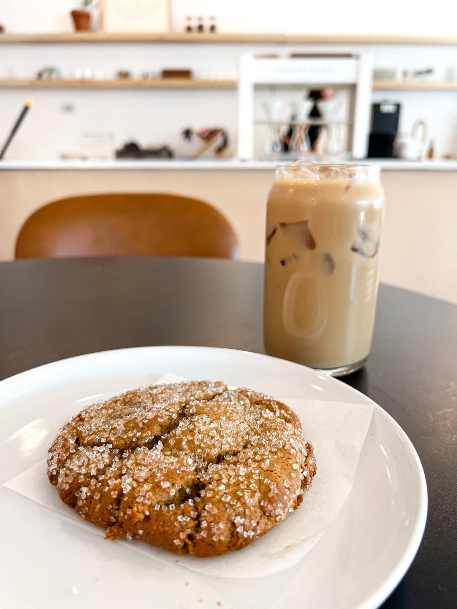 Ginger molasses cookie and an iced latte at For Keeps Coffee & Bakery.