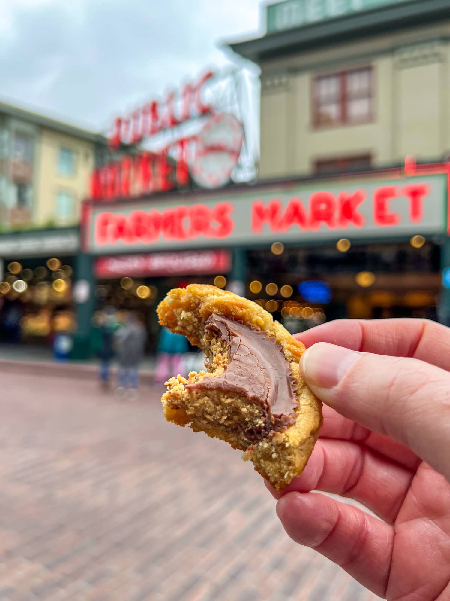 A Chocolate Drop shortbread cookie with chocolate frosting from Three Girls Bakery at Pike Place in Seattle.