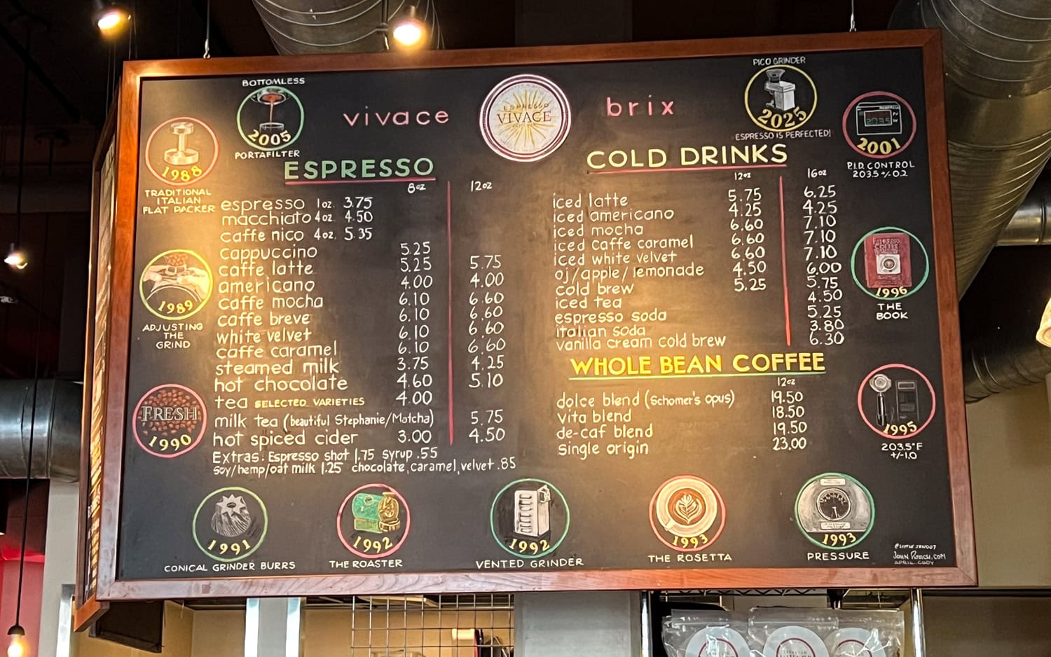 The chalkboard menu at Espresso Vivace in Capitol Hill shows key dates in the advancement of coffee-making techniques and technologies.