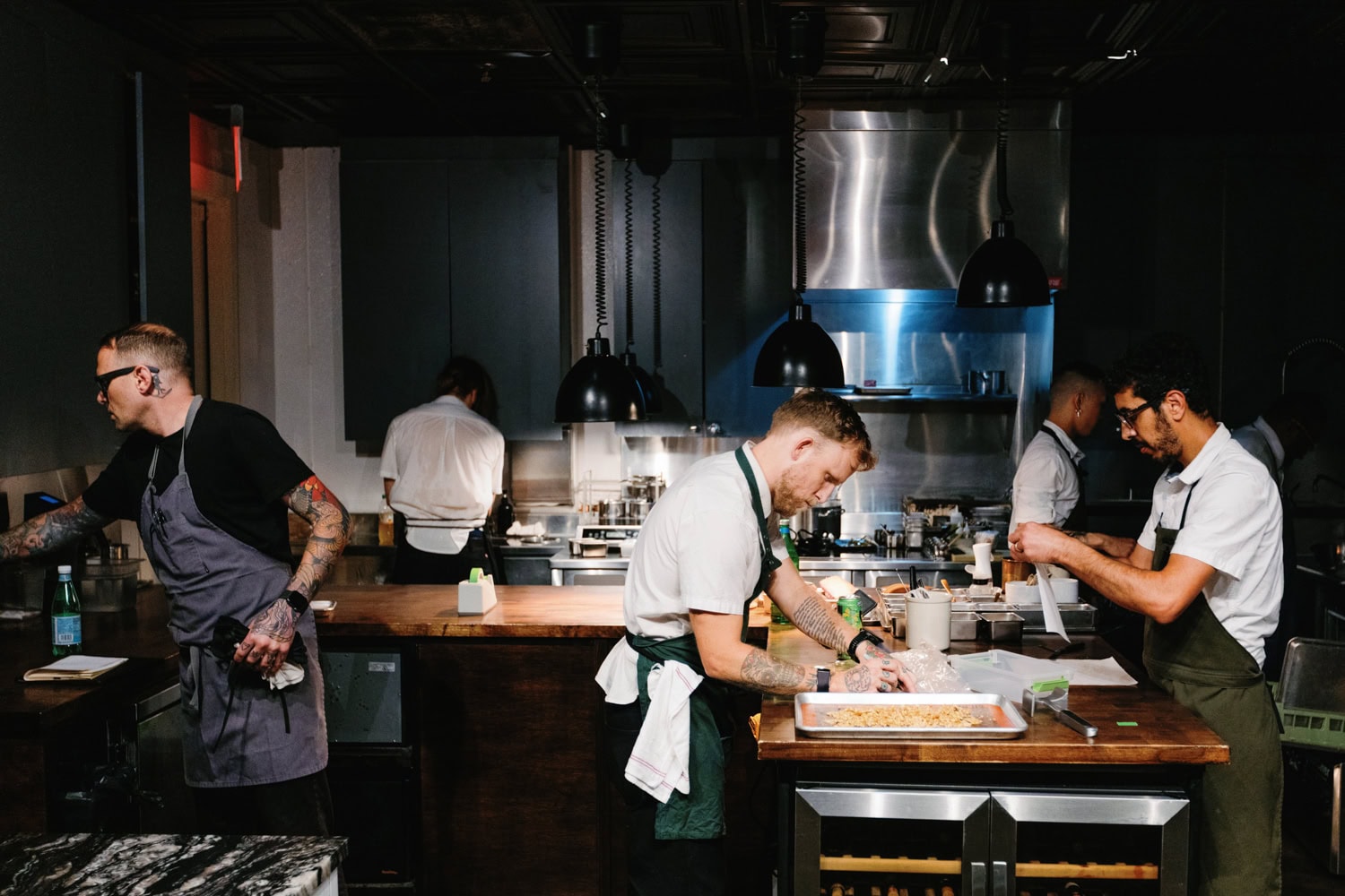 Chefs at work in the open kitchen (credit: Sarah Block Photography).