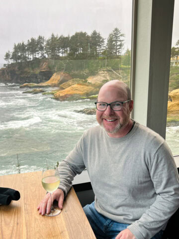 Dave with a glass of local wine (photo by Kelly Lemons).