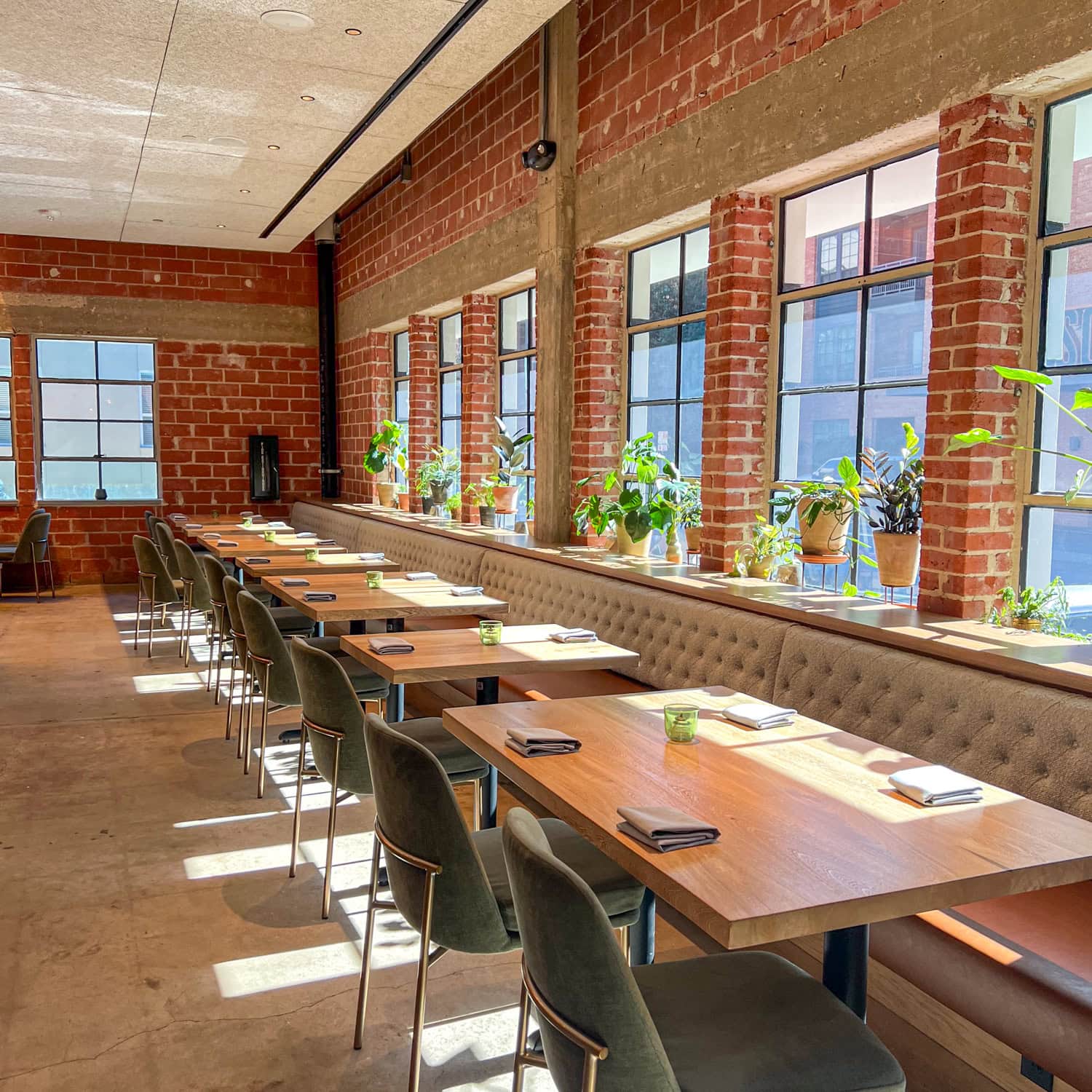 Tables inside Isidore restaurant.