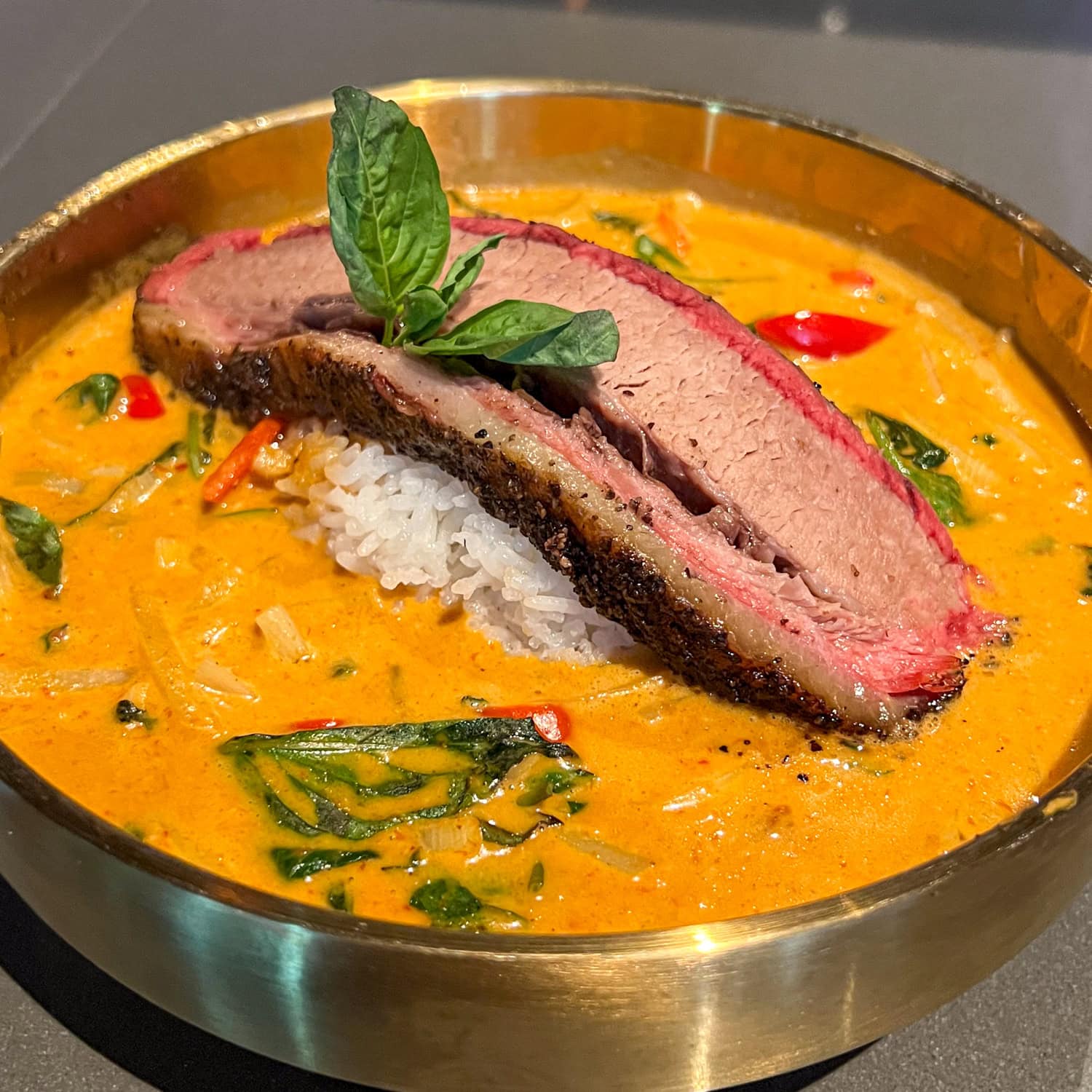 Red curry brisket at Charm Taphouse and BBQ.