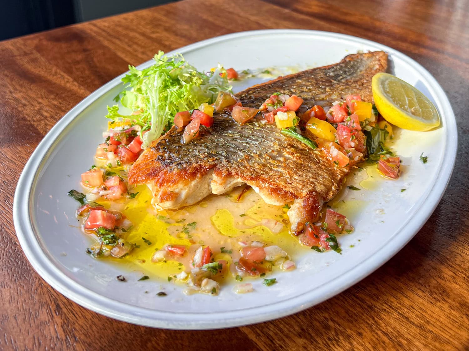 Texas redfish with heirloom tomato sauce vierge at Little's Oyster Bar.