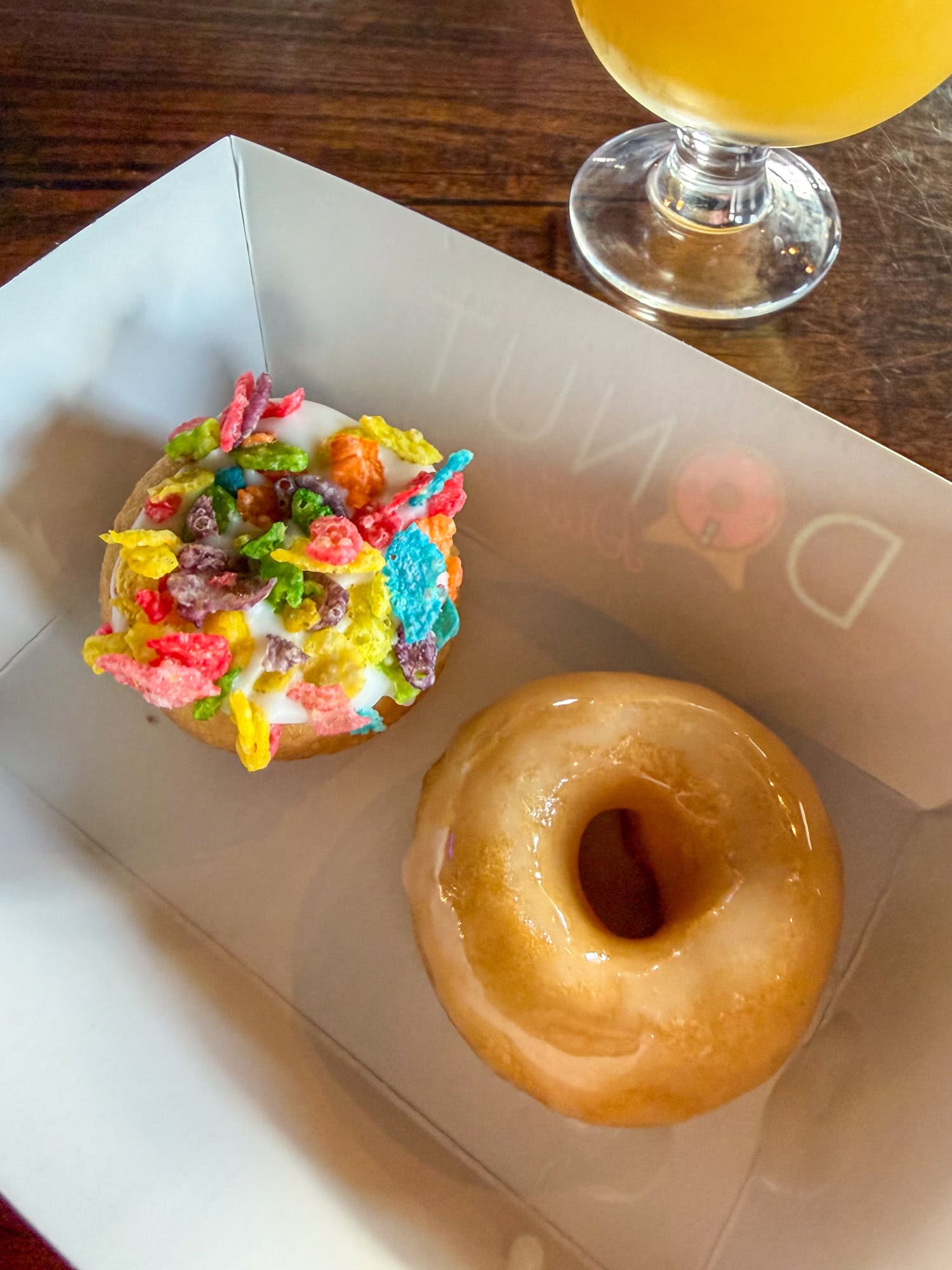 Tennessee whiskey and Fruity Pebbles mini donuts at the Donut Distillery, our first stop on an East Nashville food tour.