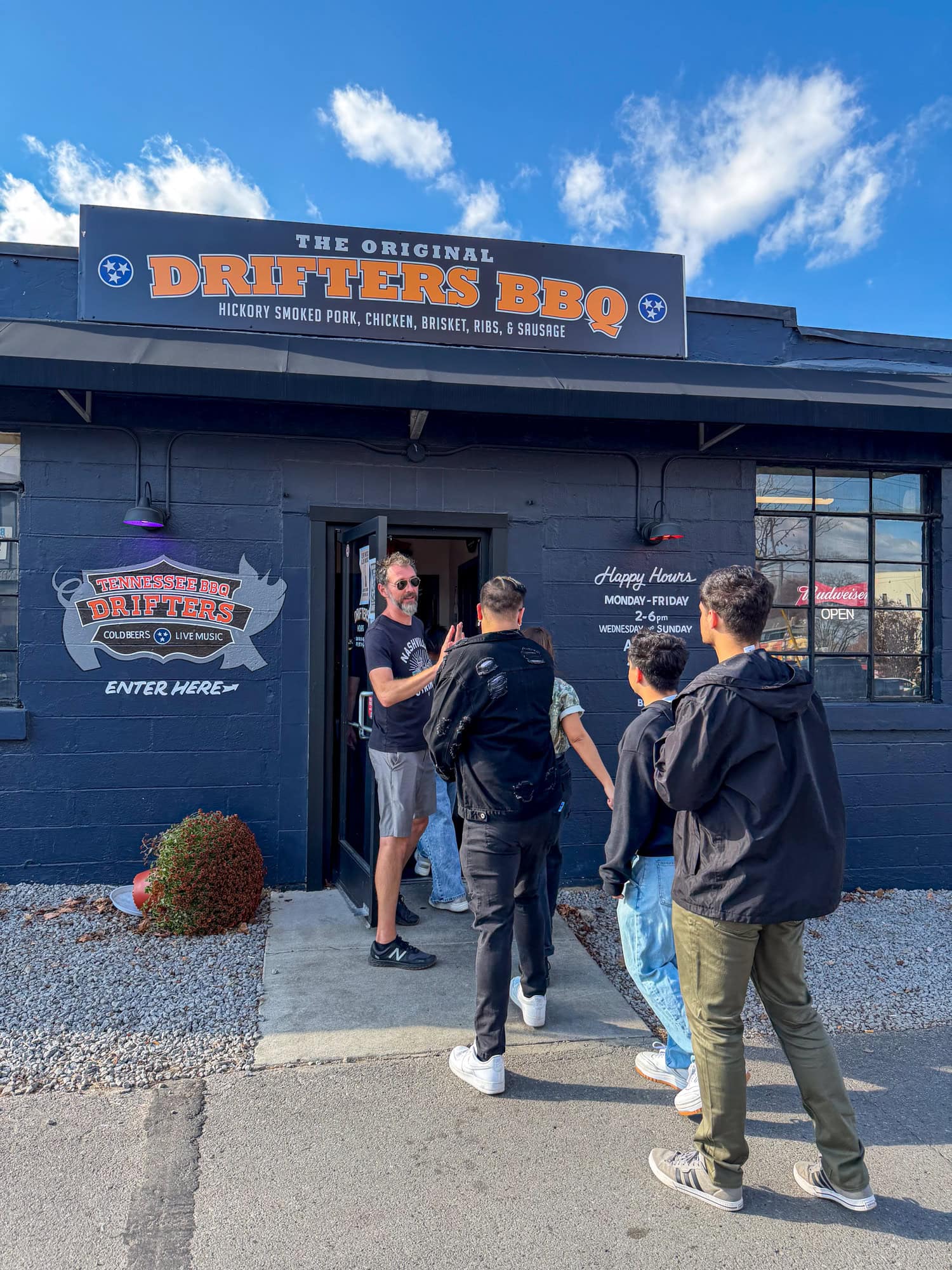 Our East Nashville food tour group enters the Original Drifters BBQ.