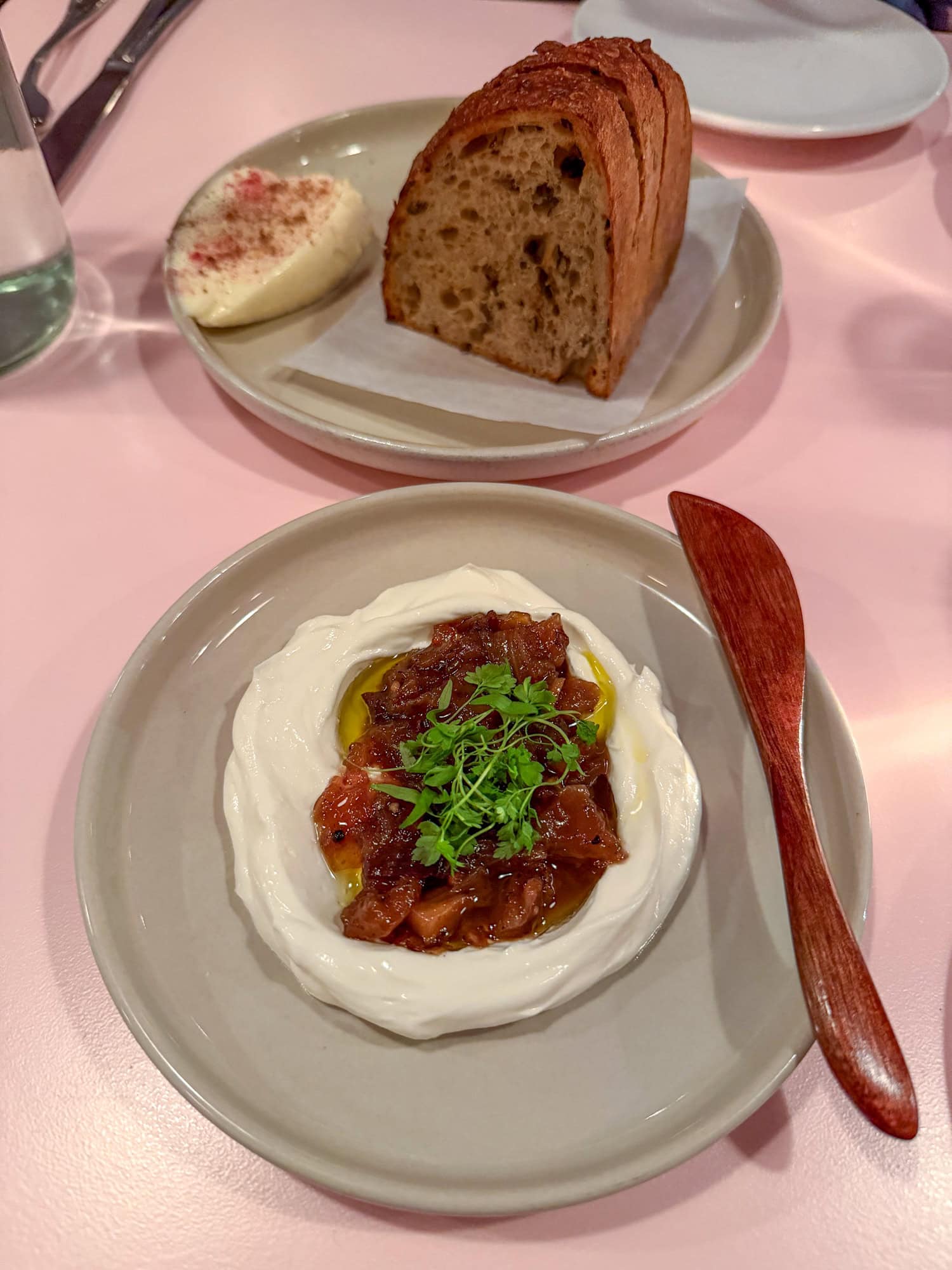 Sourdough bread and butter with preserved lemon labna at Café Roze.