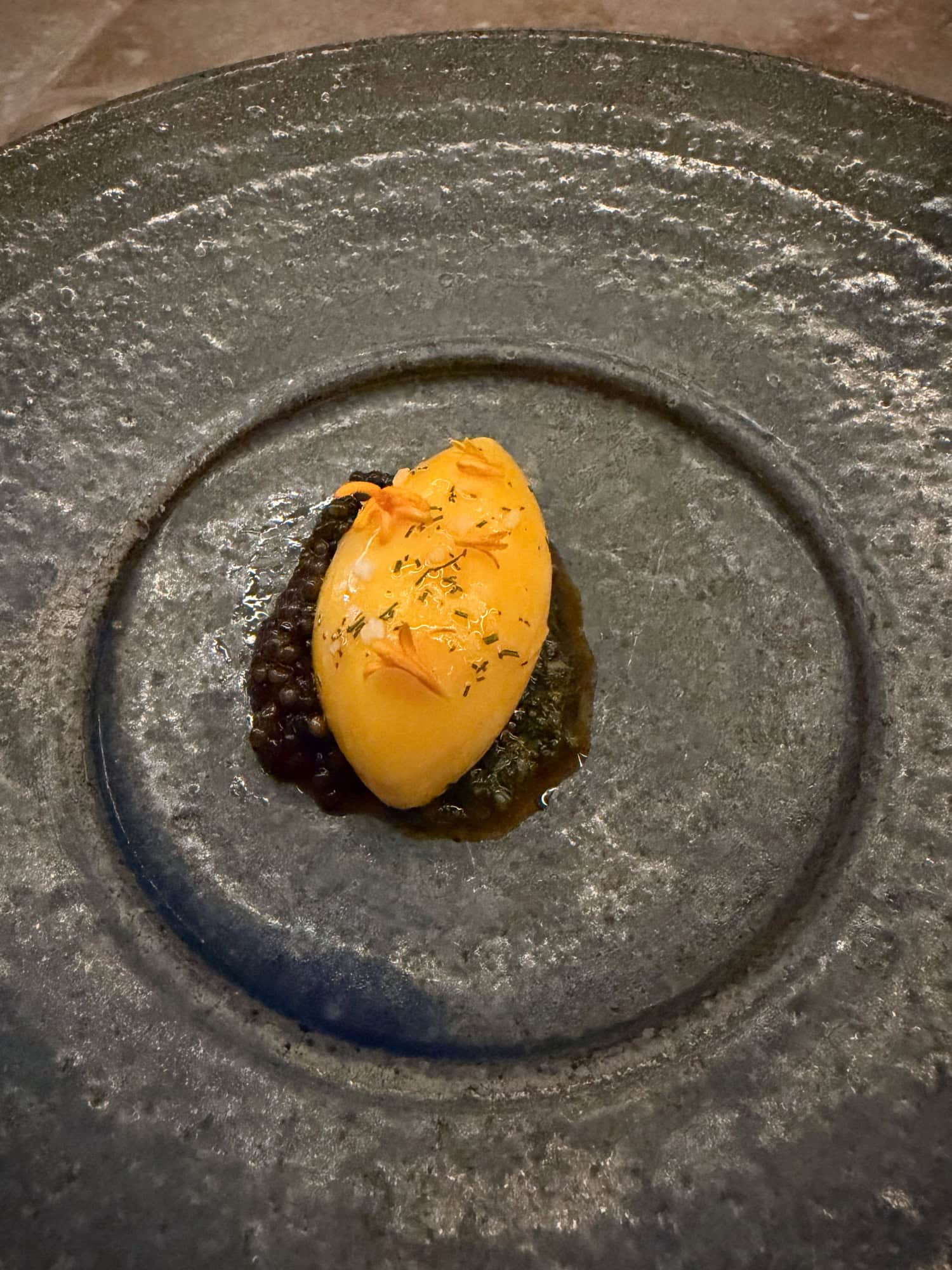 Crab omelette with Kaluga caviar served at a tasting menu dinner in Nashville.