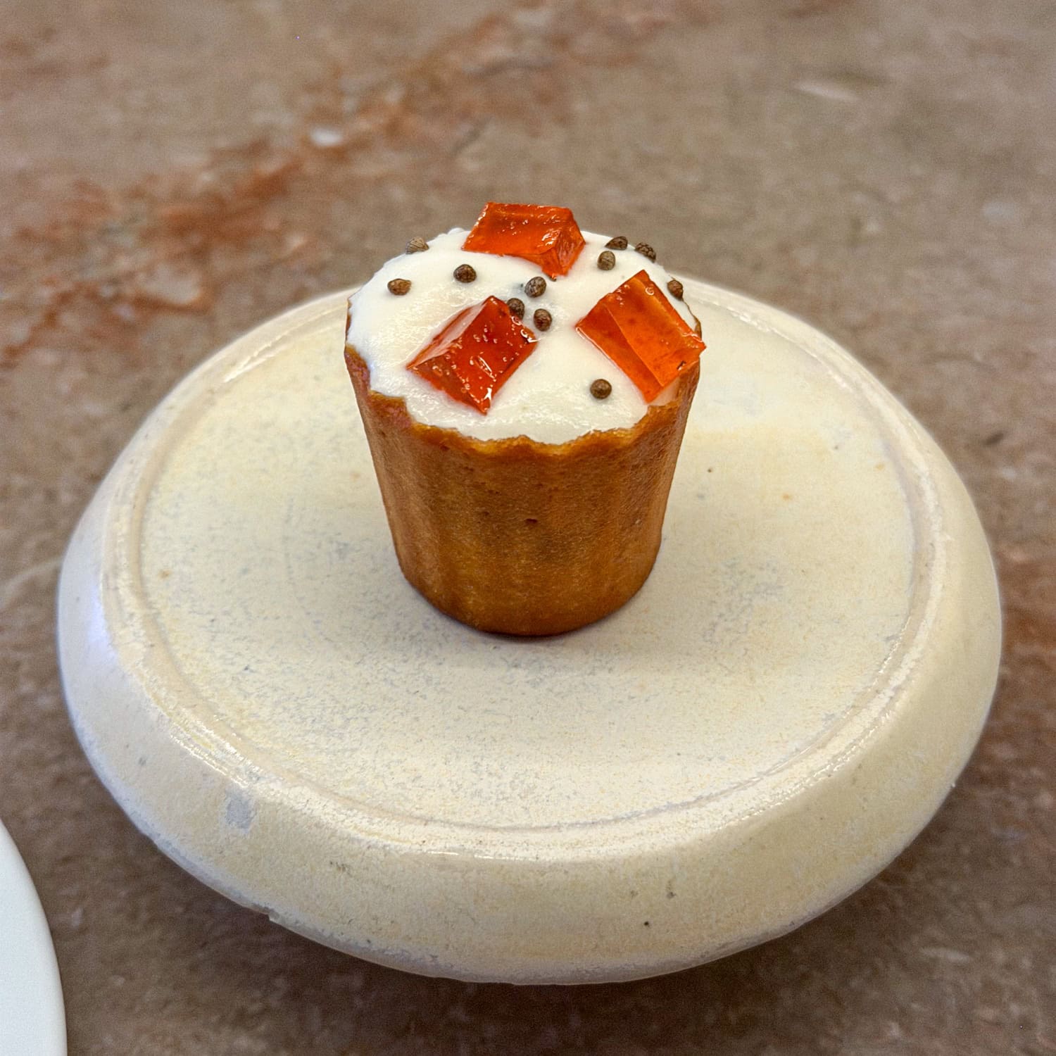 Foie gras pie with seeds, citrus, and candied seaweed cream in a potato croustade.