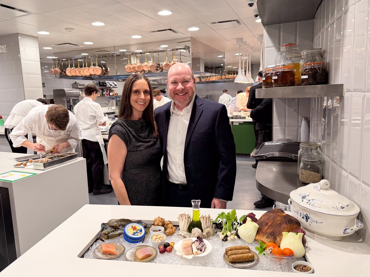 Dave and Kel pose in Emeril's kitchen.